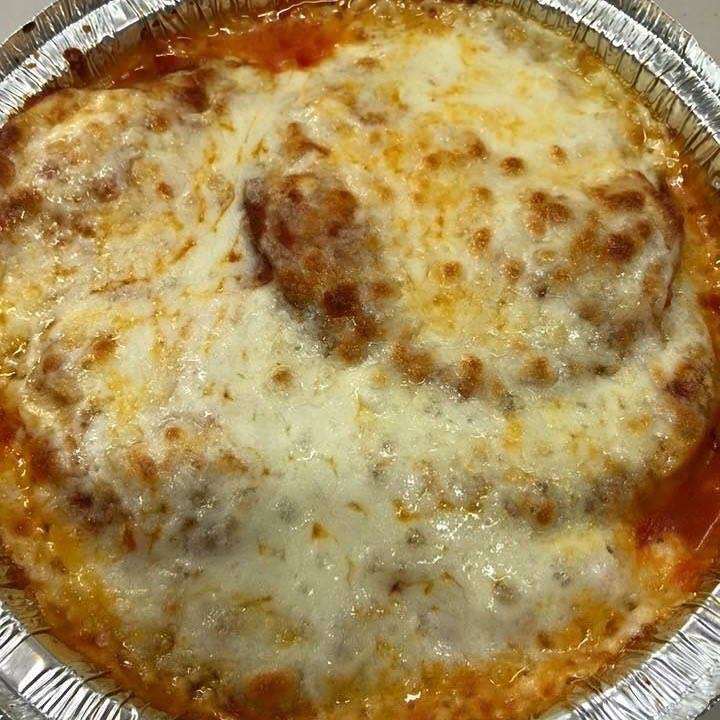 Order Eggplant Parmesan Dinner food online from Rhino's Pizzeria store, Webster on bringmethat.com
