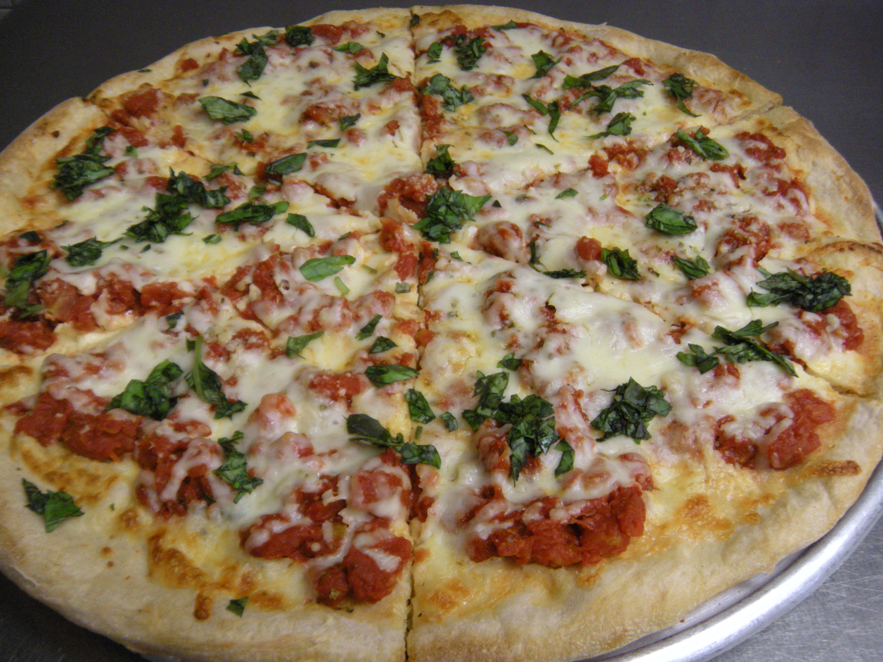 Order Tomato and Basil Pizza food online from Silvio Restaurant & Pizzeria store, Thornwood on bringmethat.com