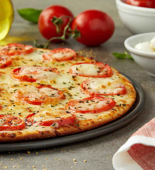 Order Margherita Pizza food online from Donatos Pizza store, Delaware on bringmethat.com