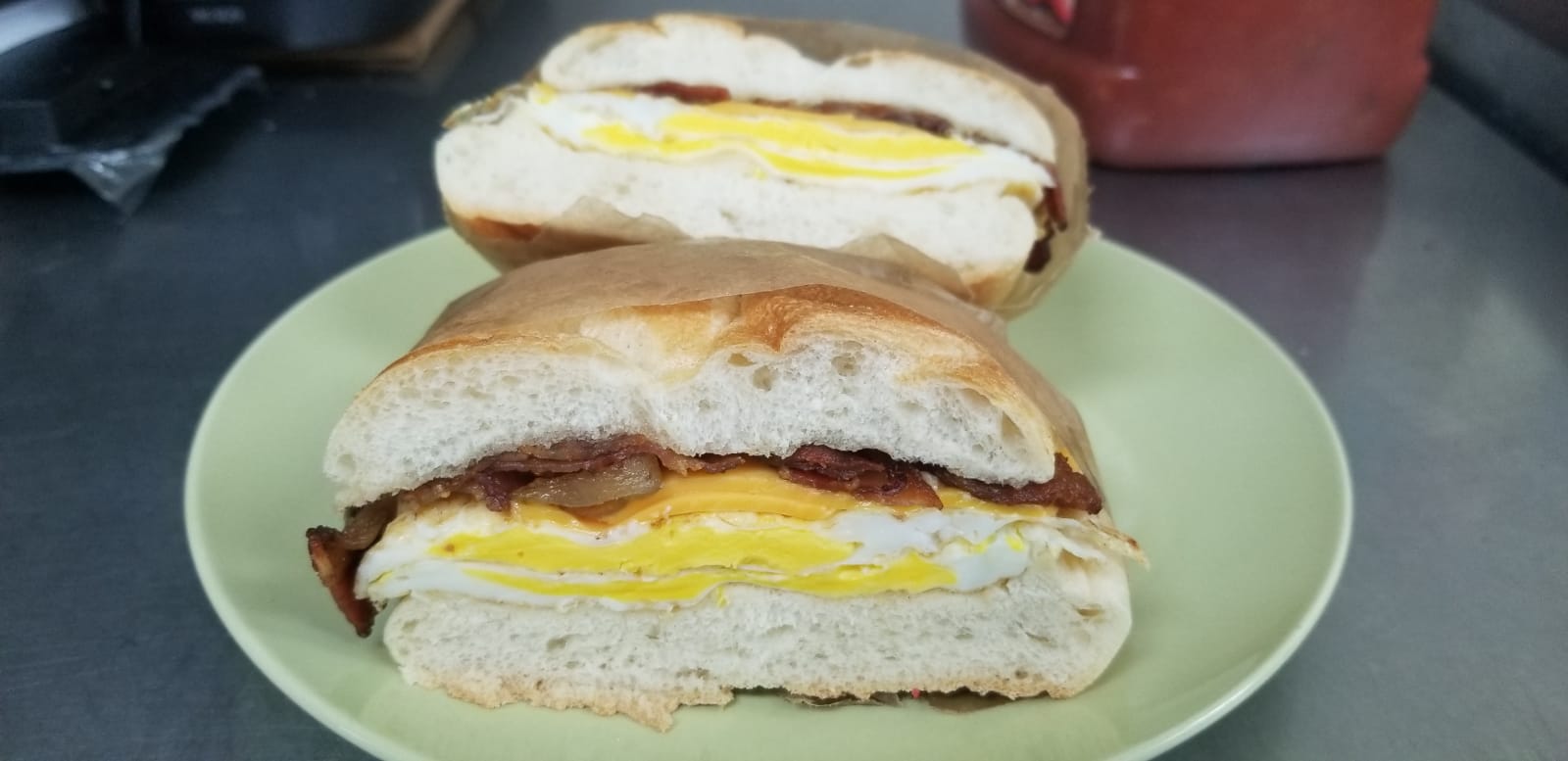Order Bacon Eggs and Cheese on choice of bread food online from Aminas Cafe store, Bronx on bringmethat.com