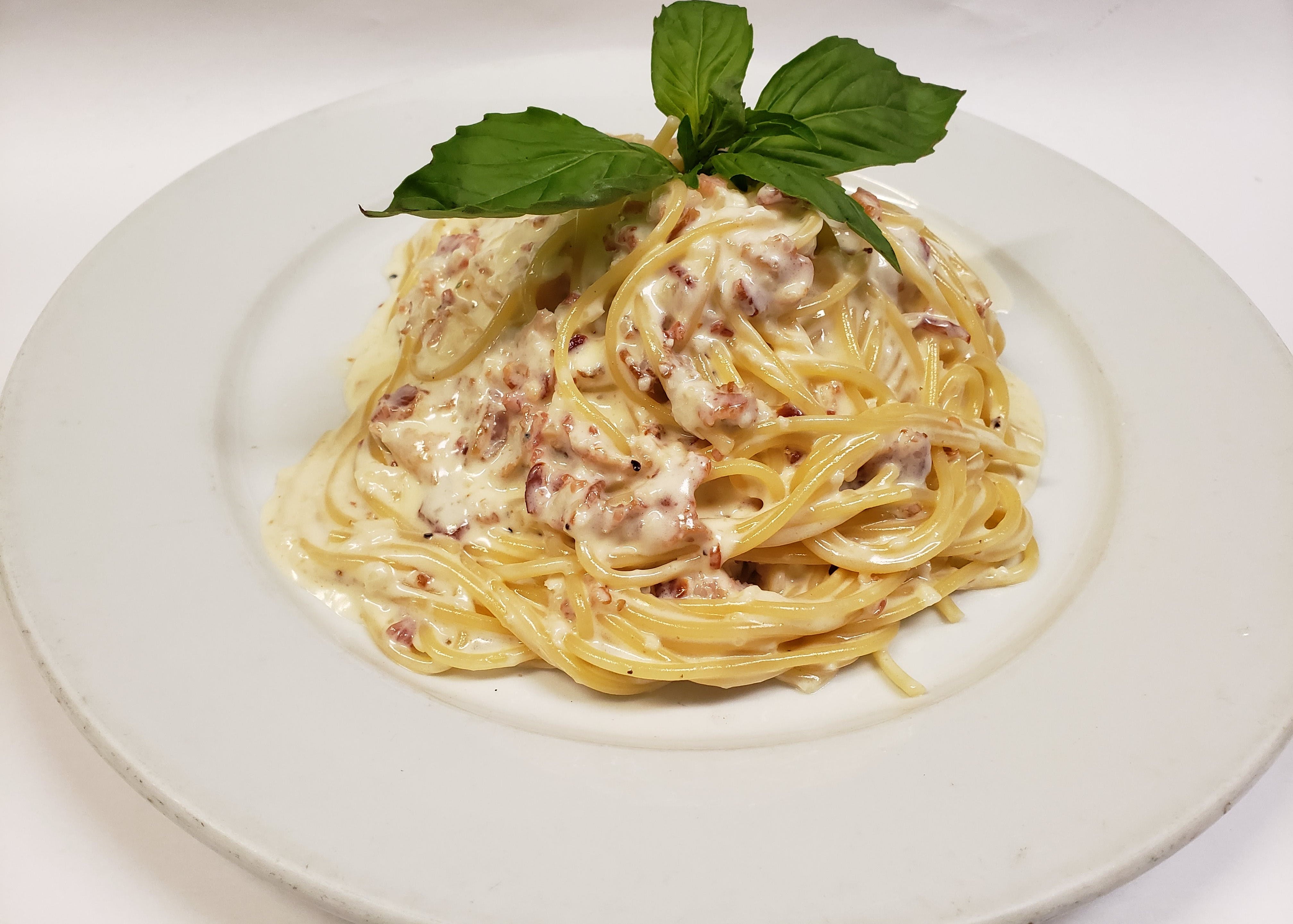 Order Spaghetti Carbonara - Pasta food online from Joe G Restaurant store, New York on bringmethat.com