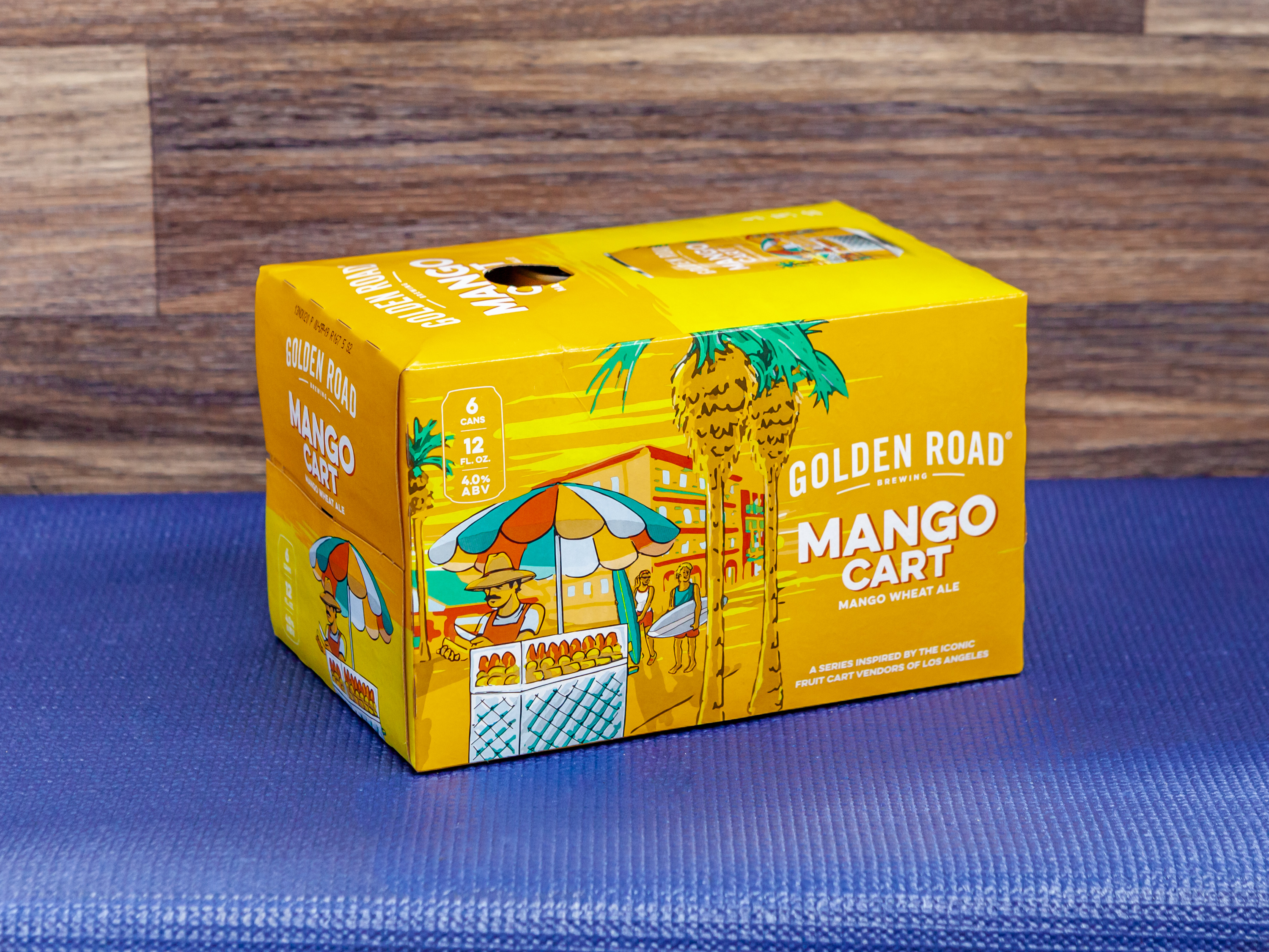 Order Golden Road Mango Cart, 6 Pack - 12 oz. Beer, 4% ABV food online from Day & Night Liquor & Market store, Venice on bringmethat.com