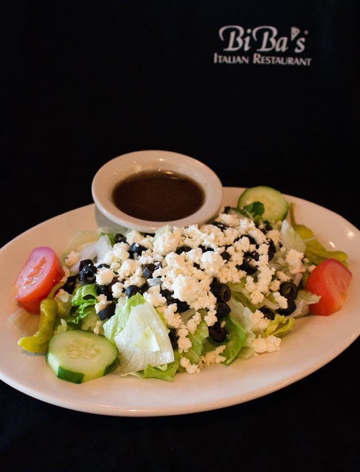 Order Greek Salad - Salad food online from Biba's Italian Restaurant store, Flowery Branch on bringmethat.com