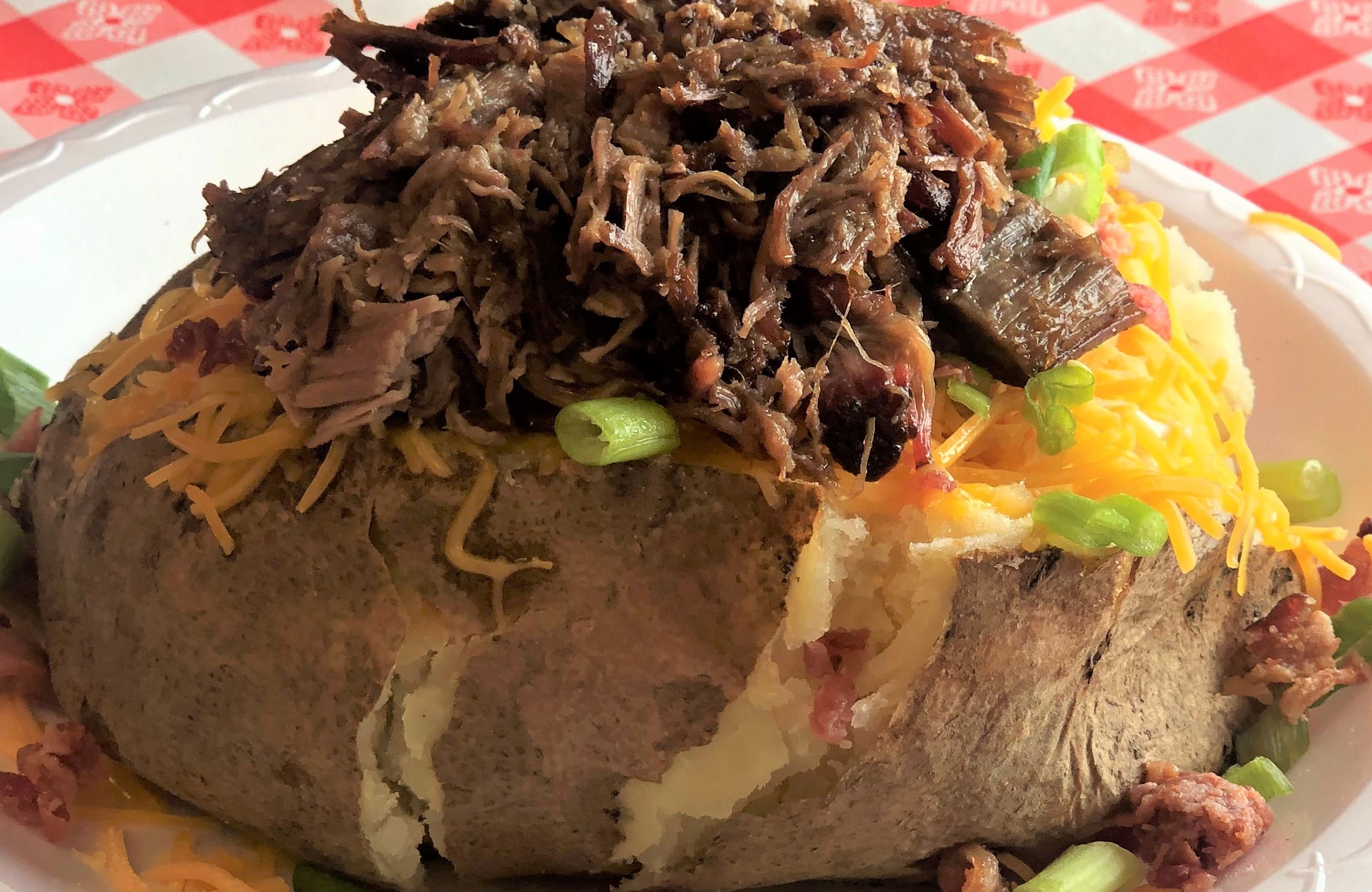 Order Loaded Tater with Meat food online from Hog Wild Pit Bar-B-Q store, Phoenix on bringmethat.com
