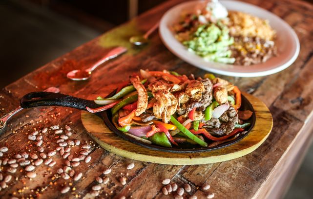 Order Texas Fajitas food online from Miguels Mexican Bar And Grill store, Colorado Springs on bringmethat.com