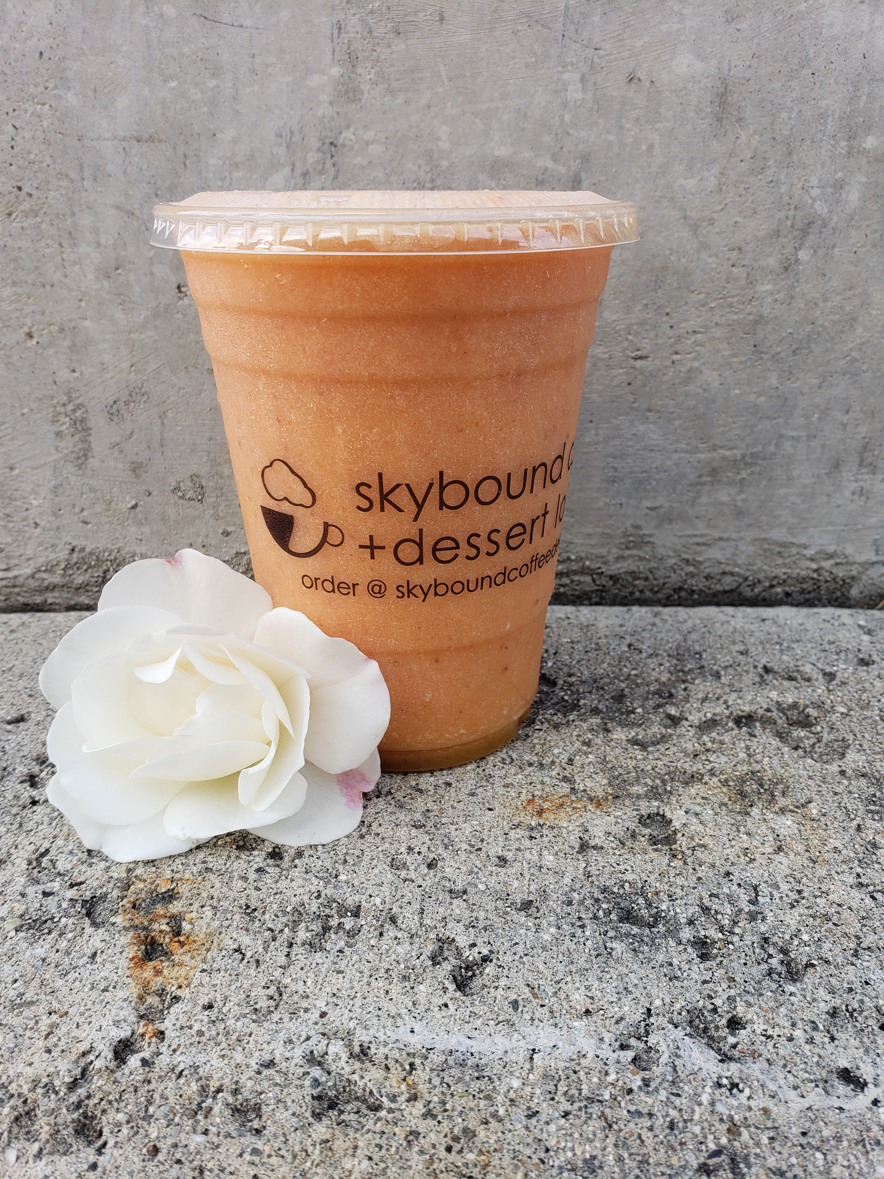 Order Tropical Sunrise Smoothie food online from Skybound Coffee + Dessert Lounge store, Vista on bringmethat.com