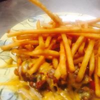 Order Smothered Chicken Strips food online from The Chile Pod store, Farmington on bringmethat.com
