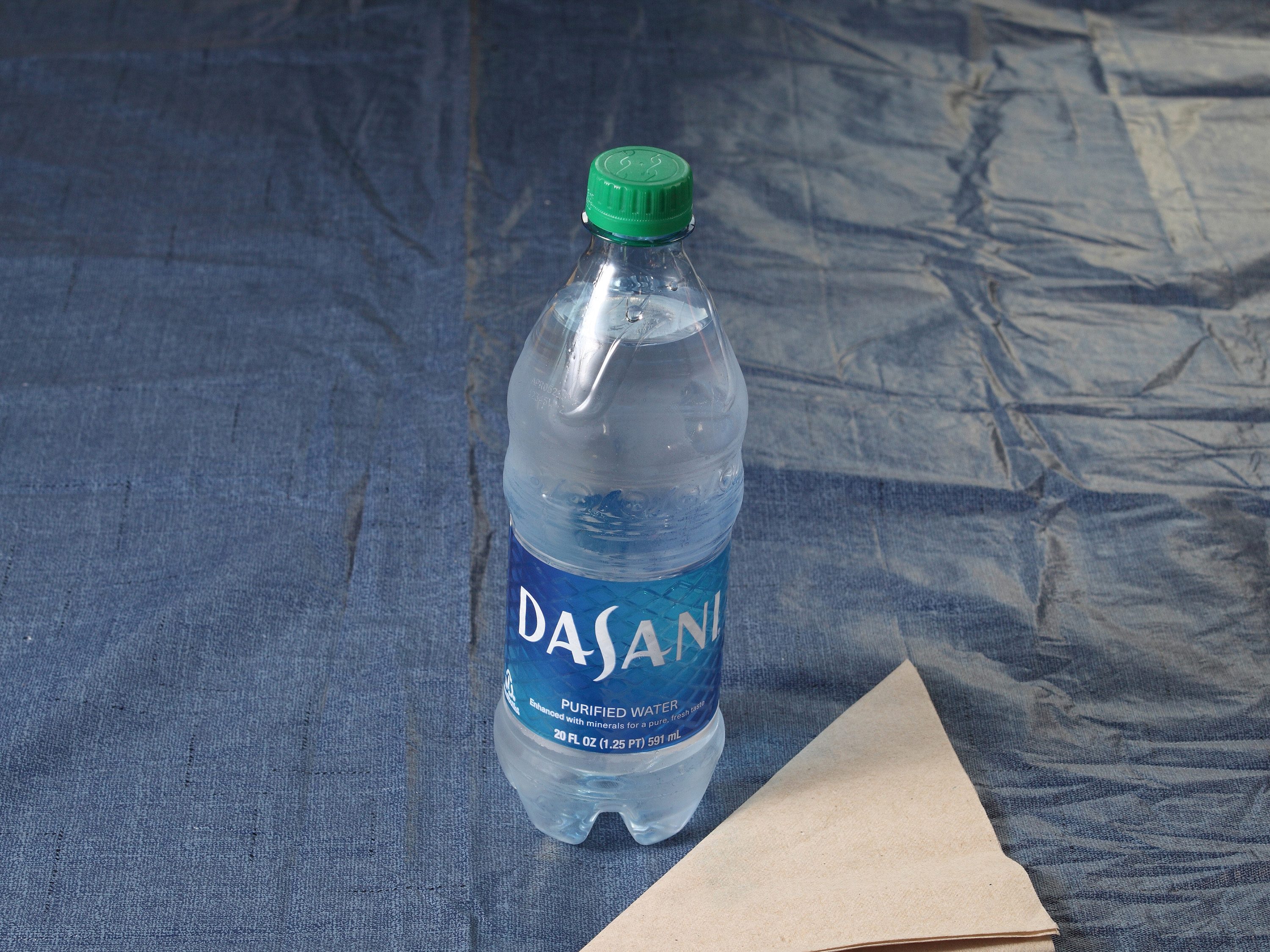 Order Dasani Water food online from Qsc Food Mart store, Lowell on bringmethat.com