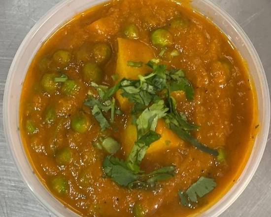 Order Aloo Matar food online from Flavours Of India store, Gresham on bringmethat.com