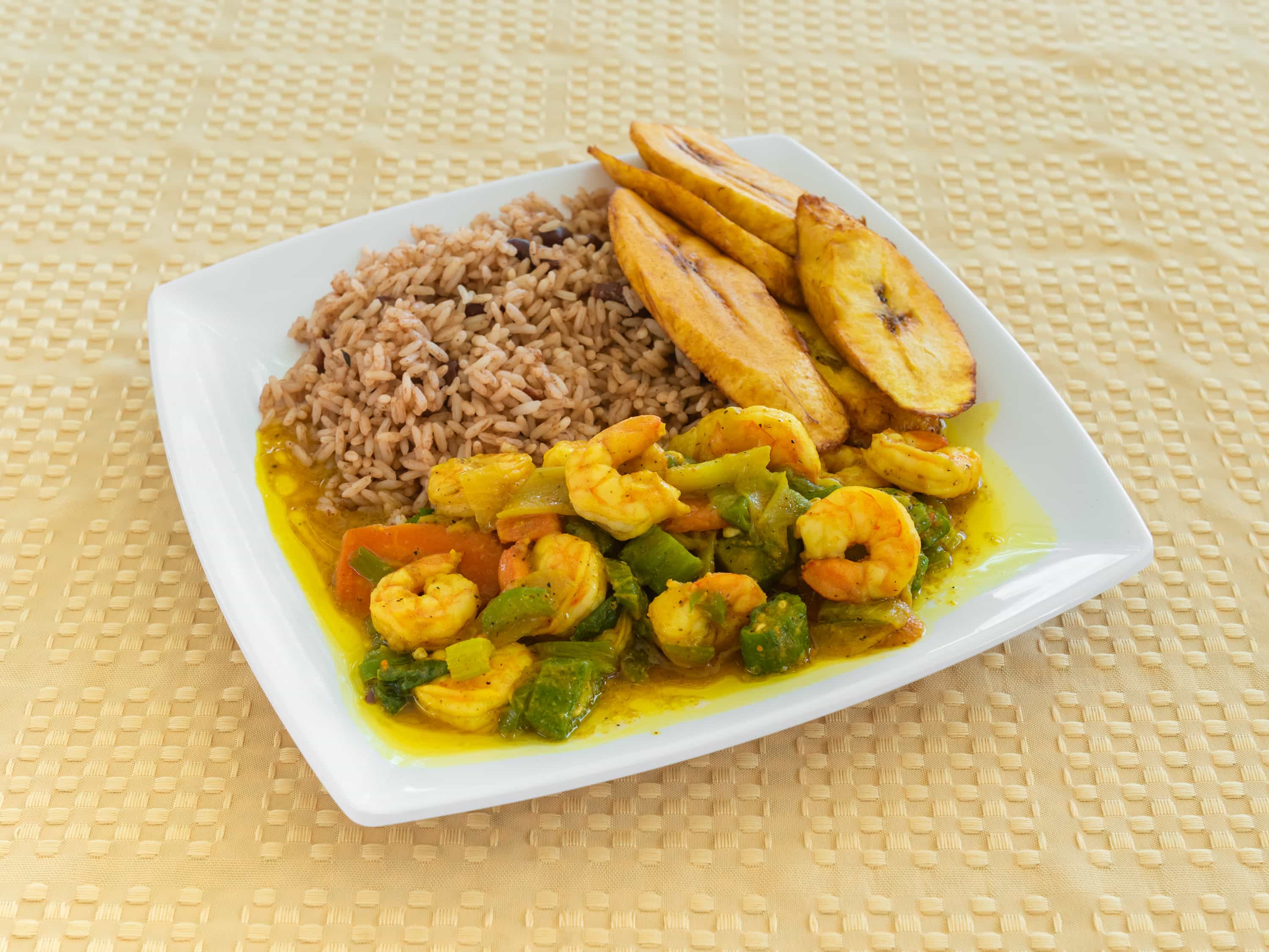 Order Curry Shrimp includes rice & cabbage food online from Iwayne Caribbean Kitchen store, Manor on bringmethat.com