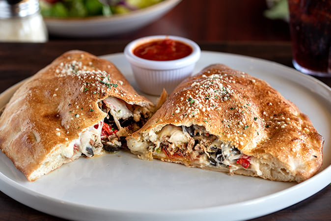 Order Stromboli food online from Russo Pizza store, Kingwood on bringmethat.com