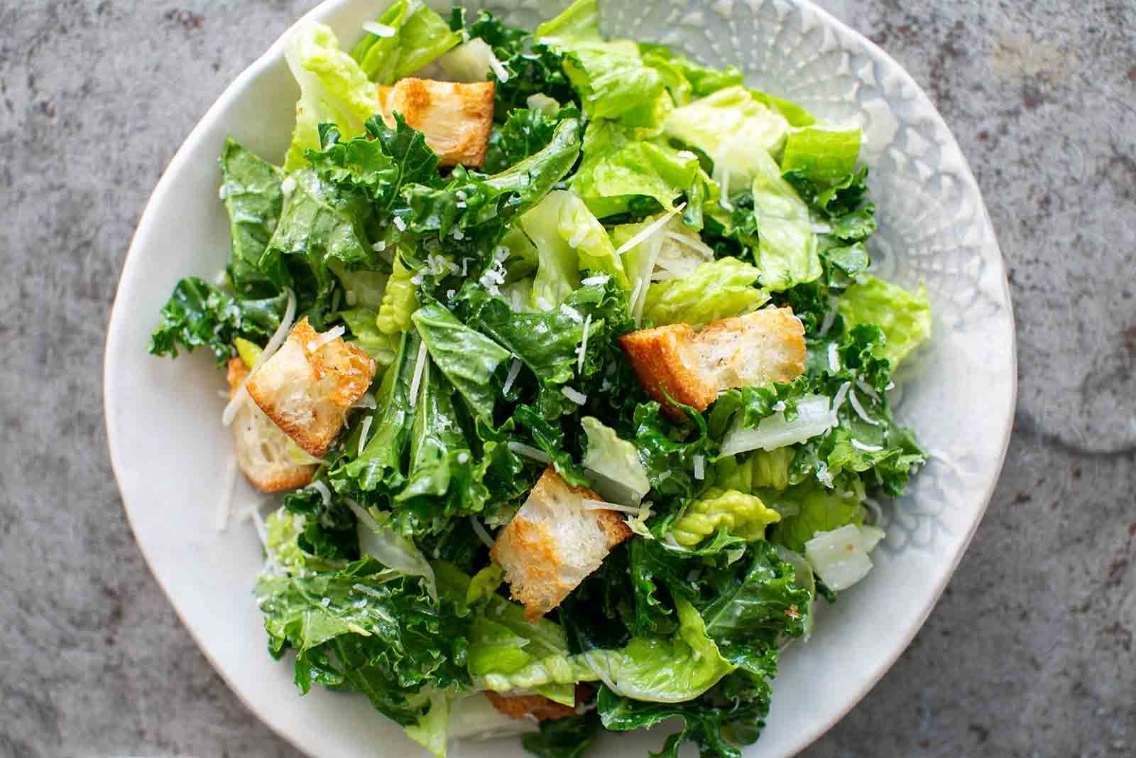 Order Caesar Salad - Salad food online from Roma Italian Restaurant store, Athens on bringmethat.com