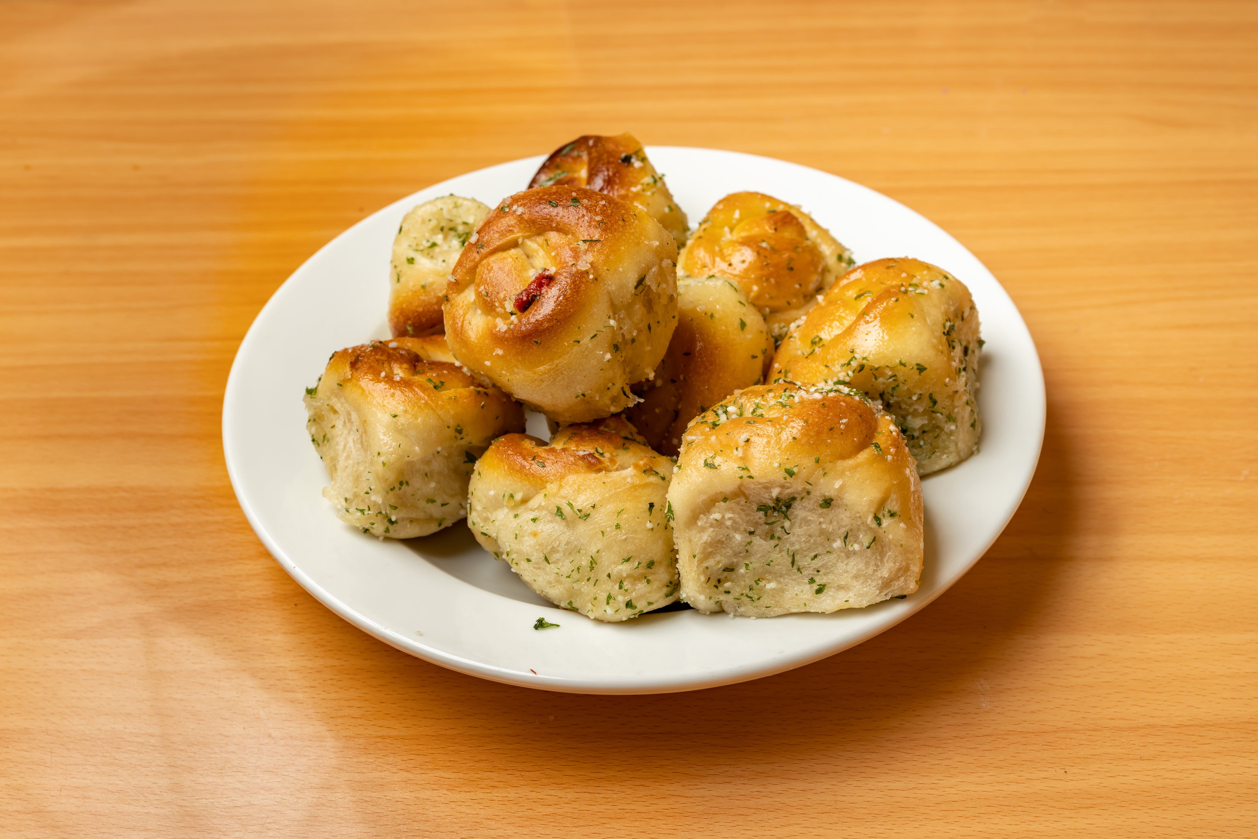 Order Garlic Knots - 6 Pieces food online from Valentino's store, Fresh Meadows on bringmethat.com