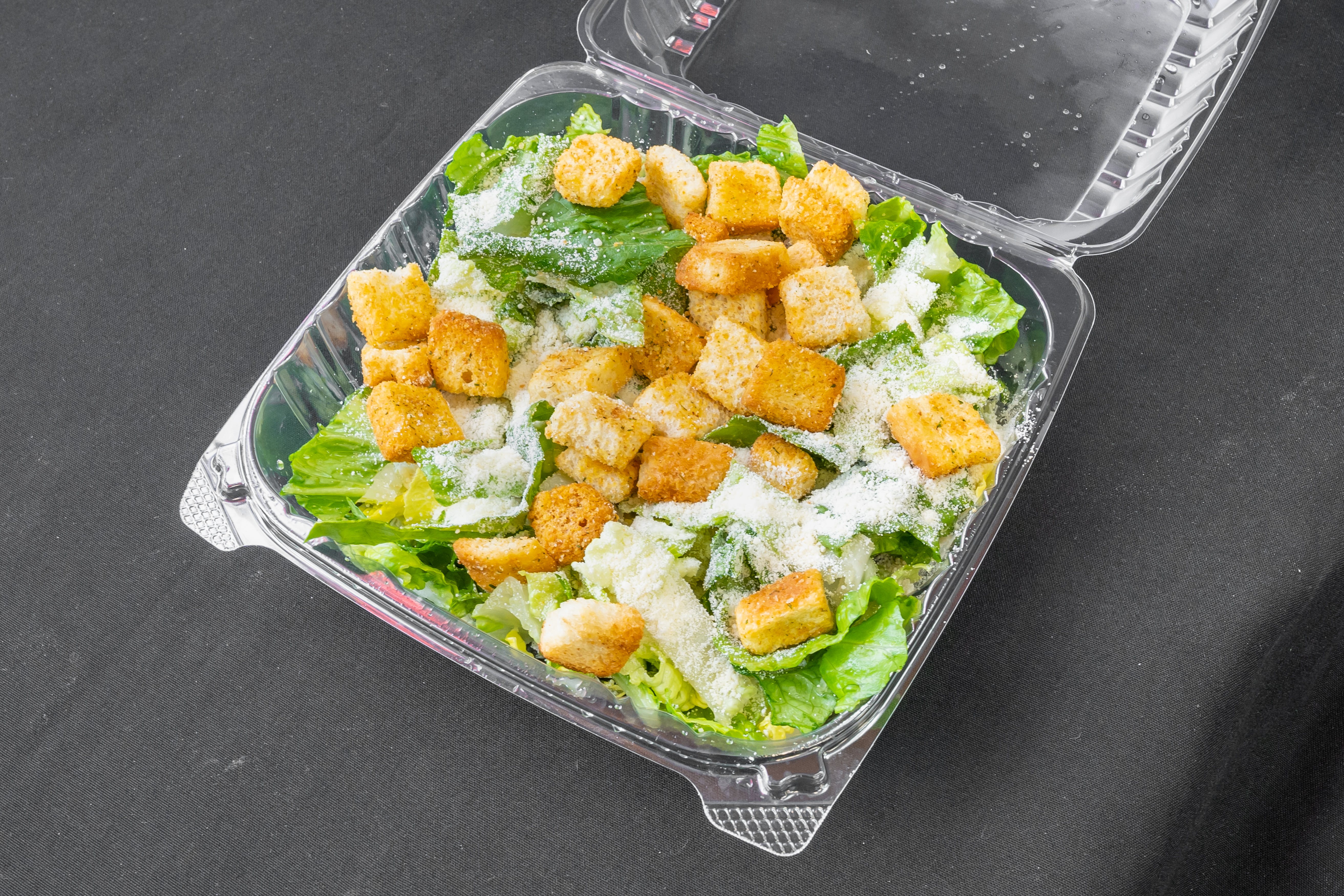 Order Plain Caesar Salad - Salad food online from Eds Pizza House store, Philadelphia on bringmethat.com