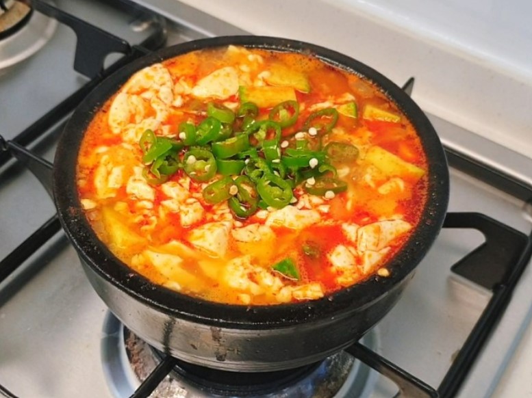Order Soft Tofu Soup 순두부찌개 food online from Bam Bam Kitchen store, Ardmore on bringmethat.com