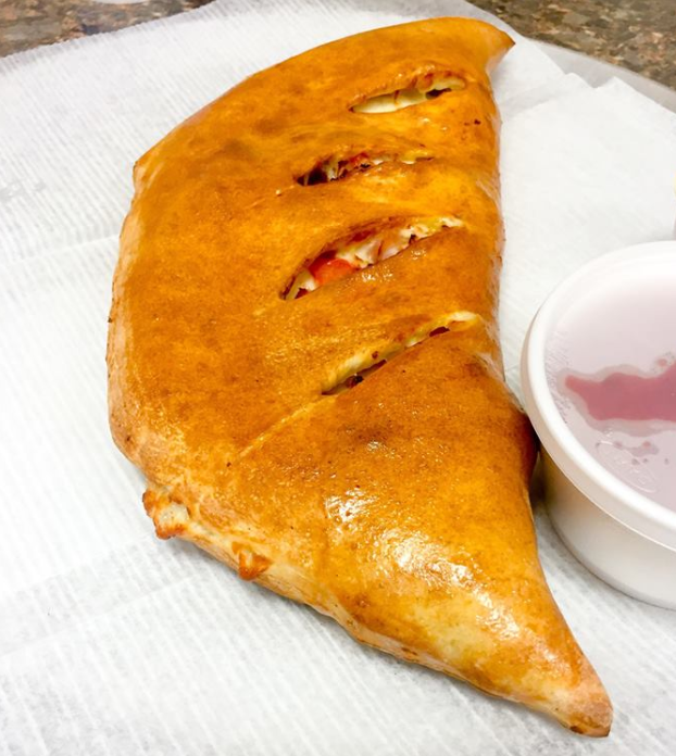 Order Meatlovers Calzone food online from Slices Pizzeria store, Bel Air on bringmethat.com