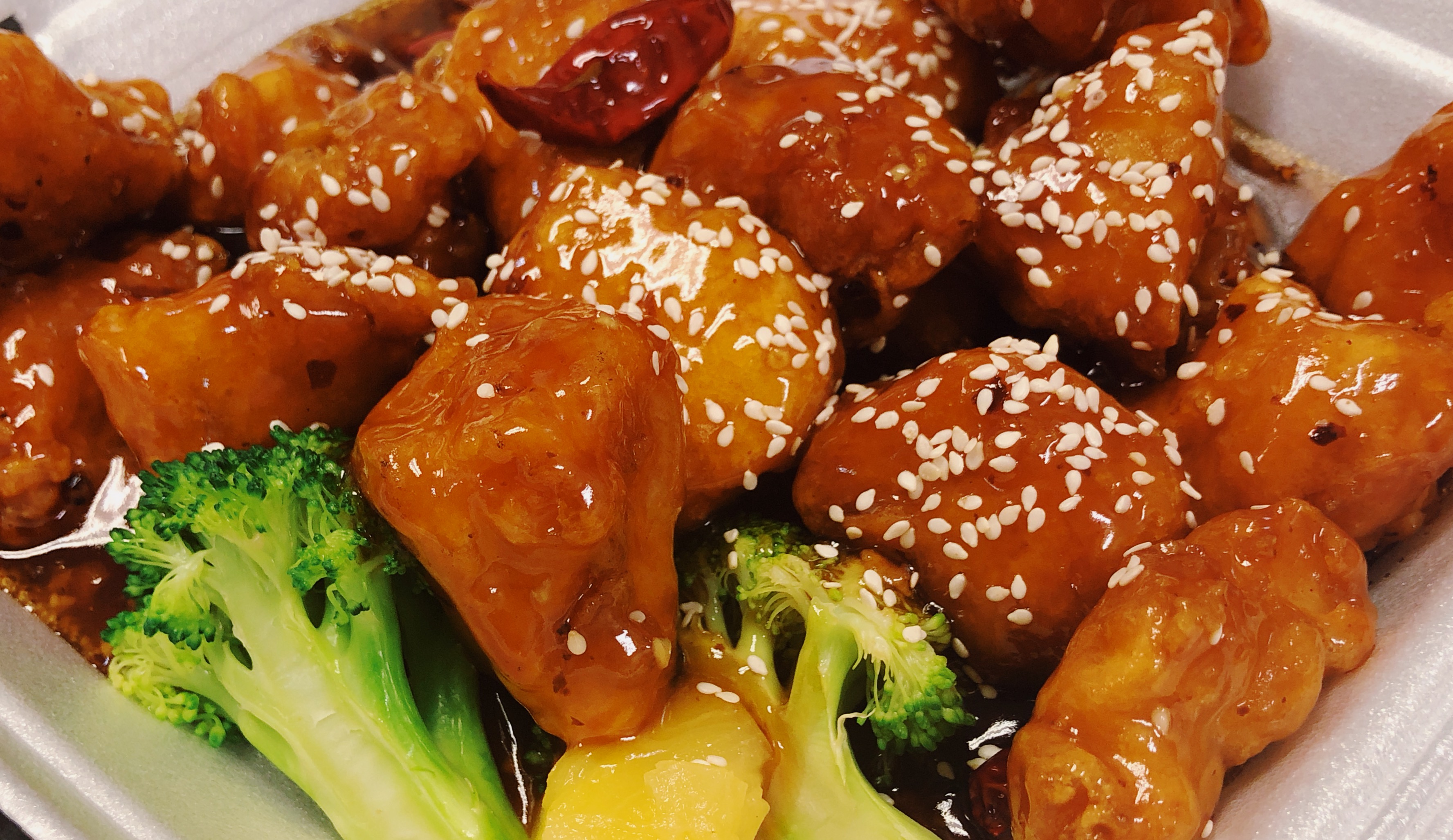 Order Sesame Chicken food online from New China Cuisine store, North Las Vegas on bringmethat.com