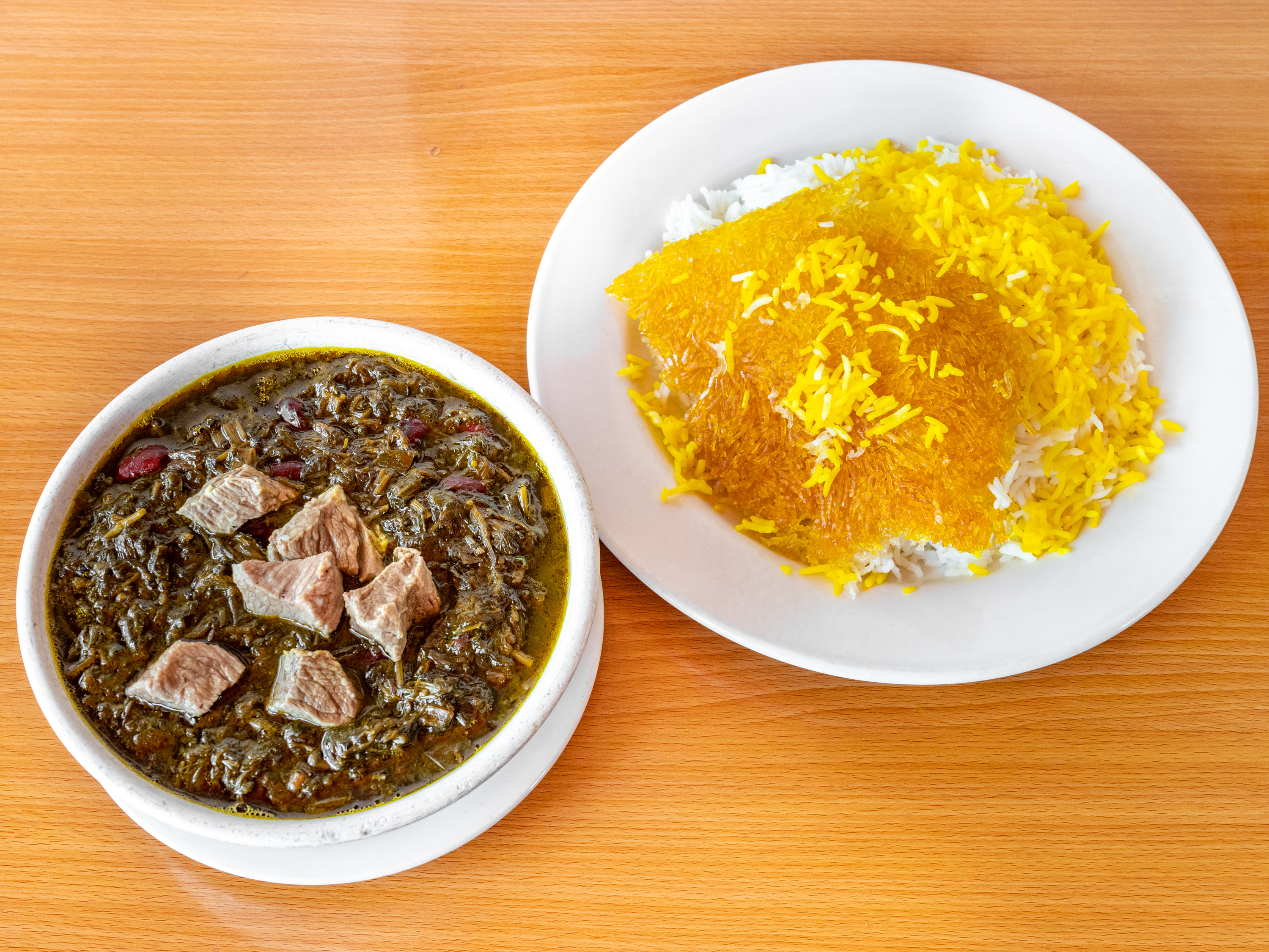 Order Ghormeh Sabzi (Beef or Chicken) food online from Fanoos Grill store, Torrance on bringmethat.com