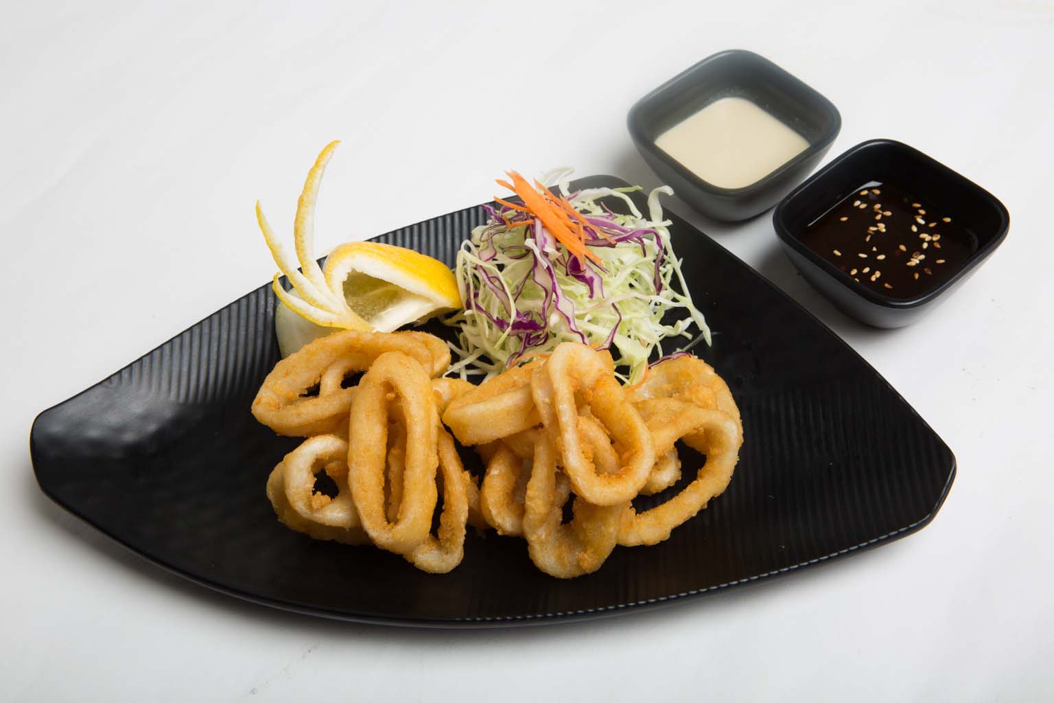 Order Squid Ring food online from Kaiba Japanese Restaurant store, Anaheim on bringmethat.com