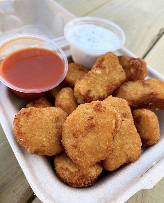 Order "Chicken" Nuggets 12pc food online from Plow Burger store, Denton on bringmethat.com