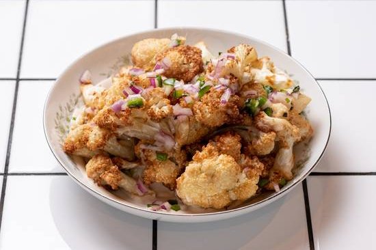 Order Cauliflower food online from 12 chairs store, New York on bringmethat.com