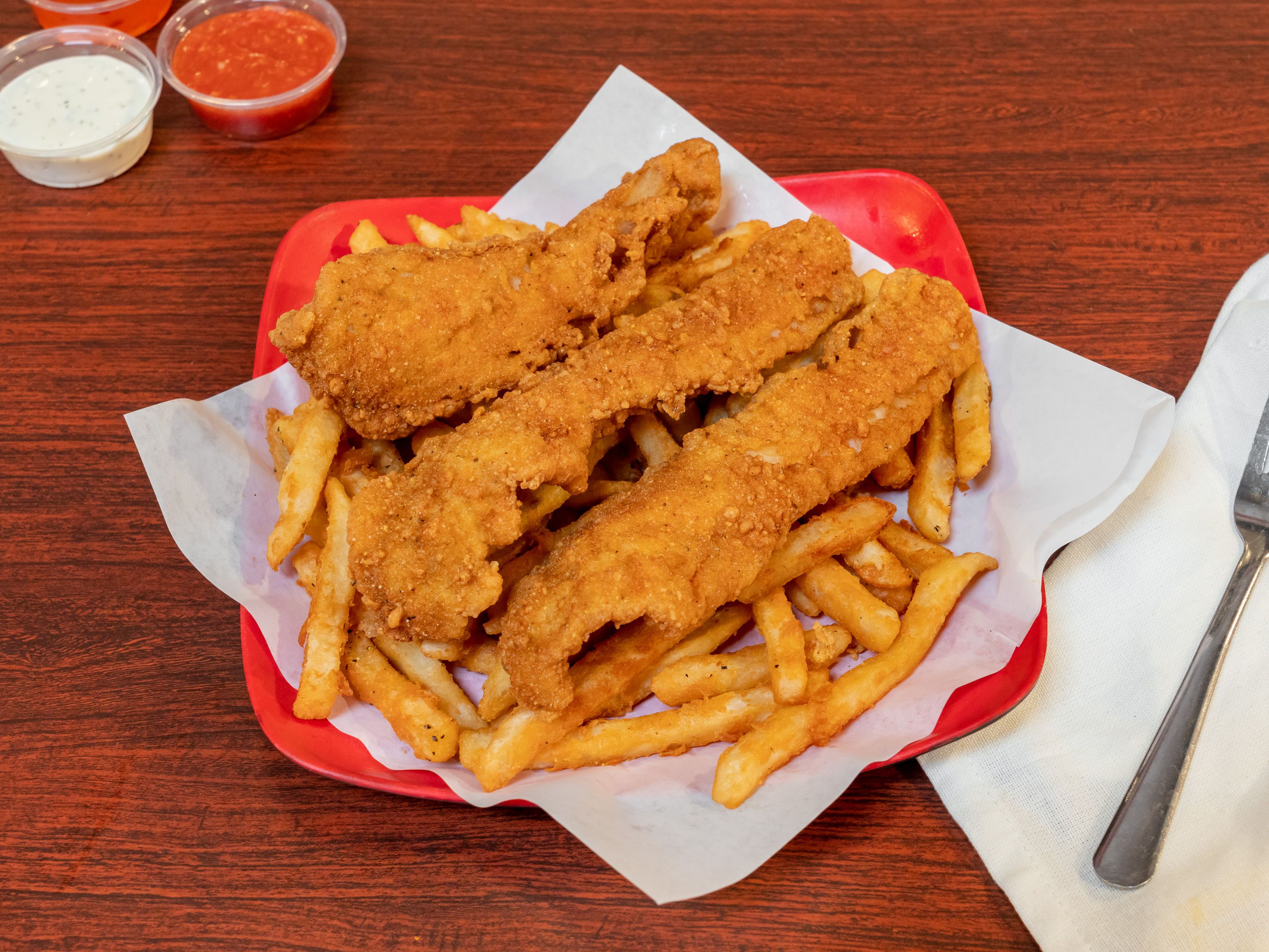 Order Fish and Chips Basket food online from Fried Or Boiled Seafood Fusion store, Fresno on bringmethat.com