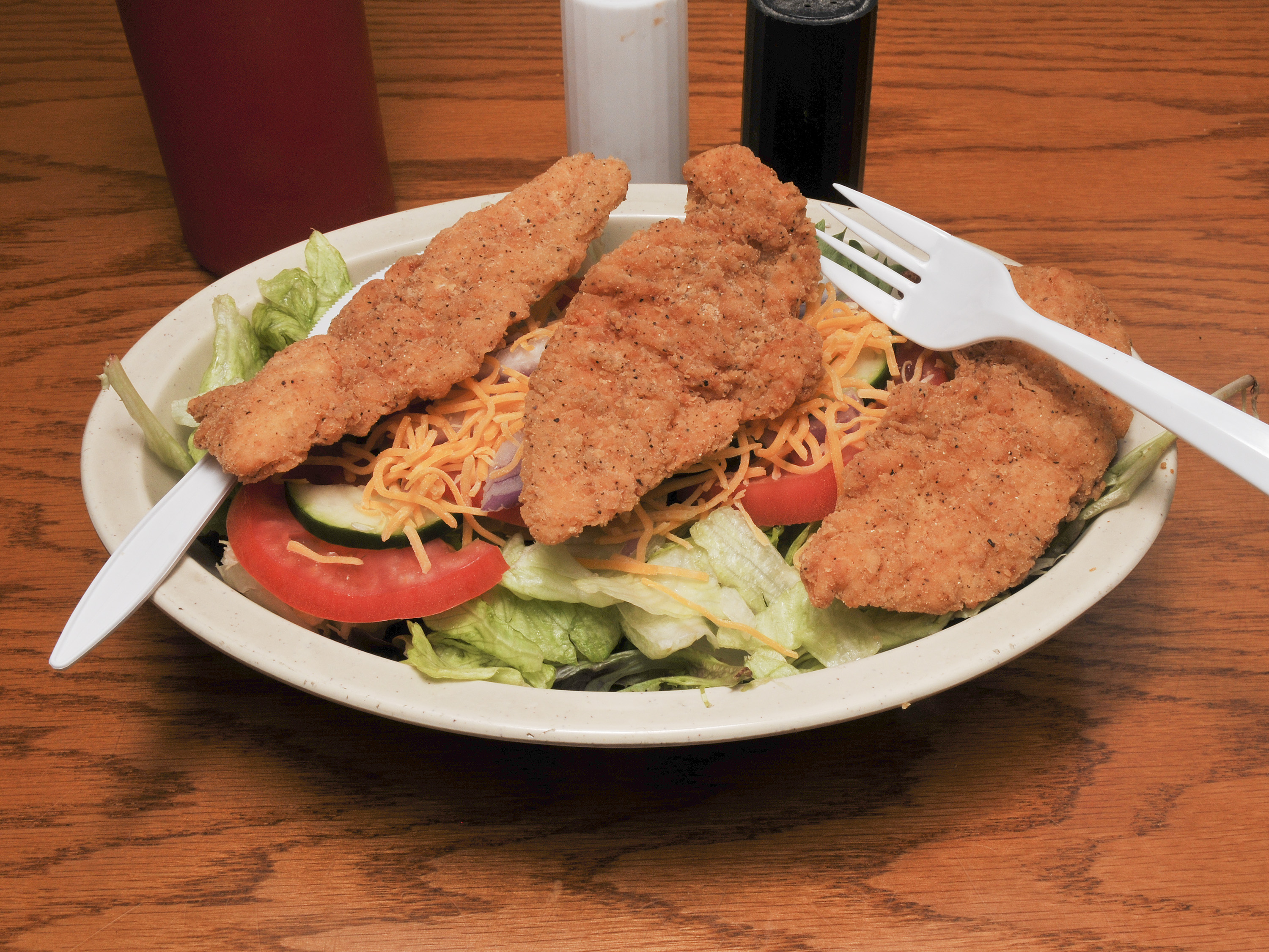 Order Chicken Tender Salad food online from P.T.'s Olde Fashioned Grille store, Goldsboro on bringmethat.com