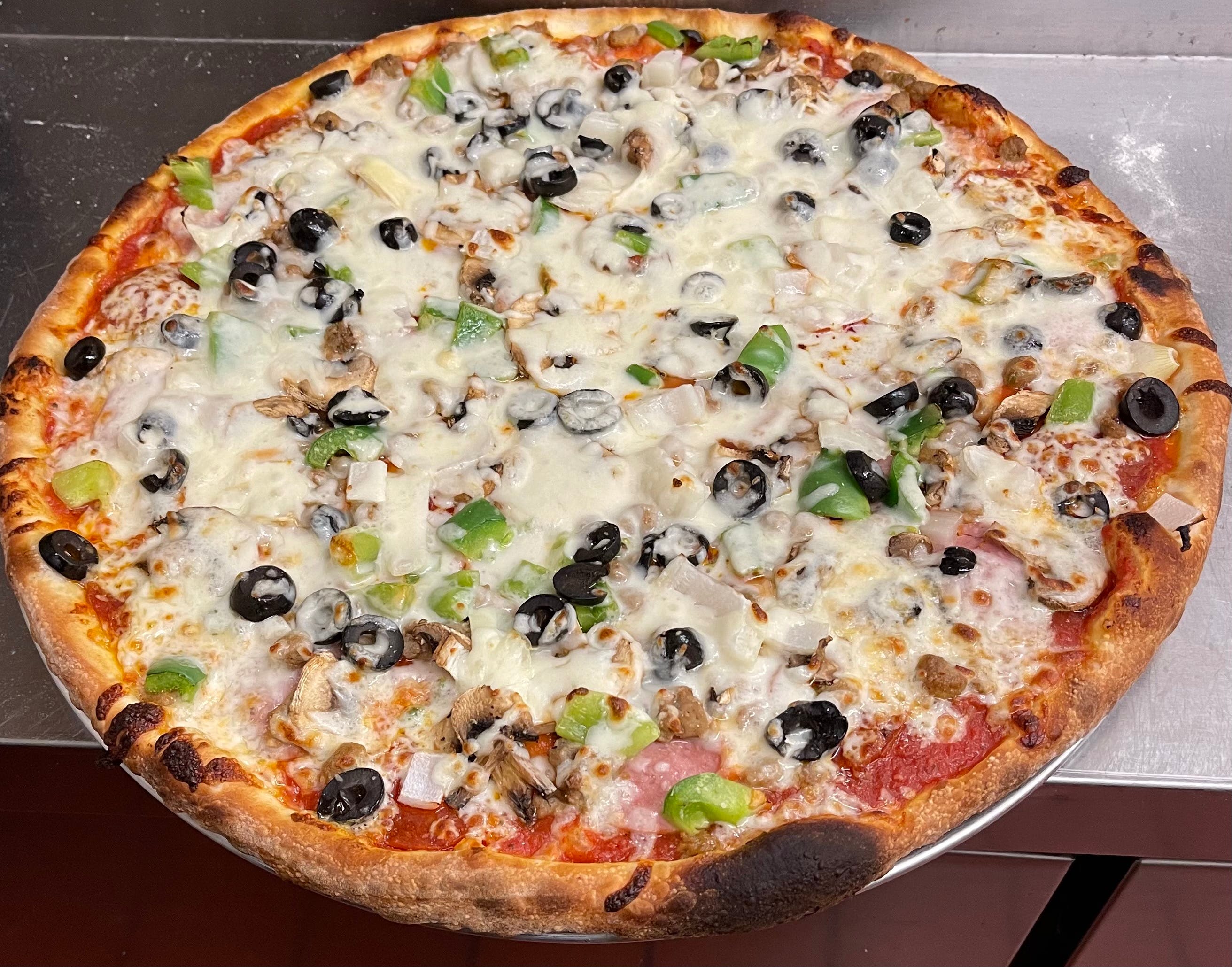 Order Supreme Pizza - Personal 10" food online from Luigis Italian Restaurant store, Uvalde on bringmethat.com
