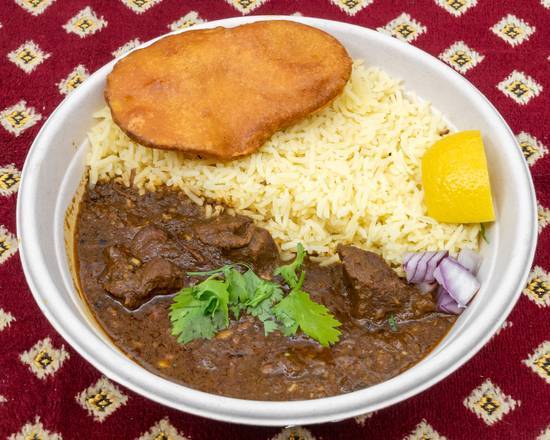 Order Lamb Rogan Josh food online from Curry In A Hurry store, Minneapolis on bringmethat.com
