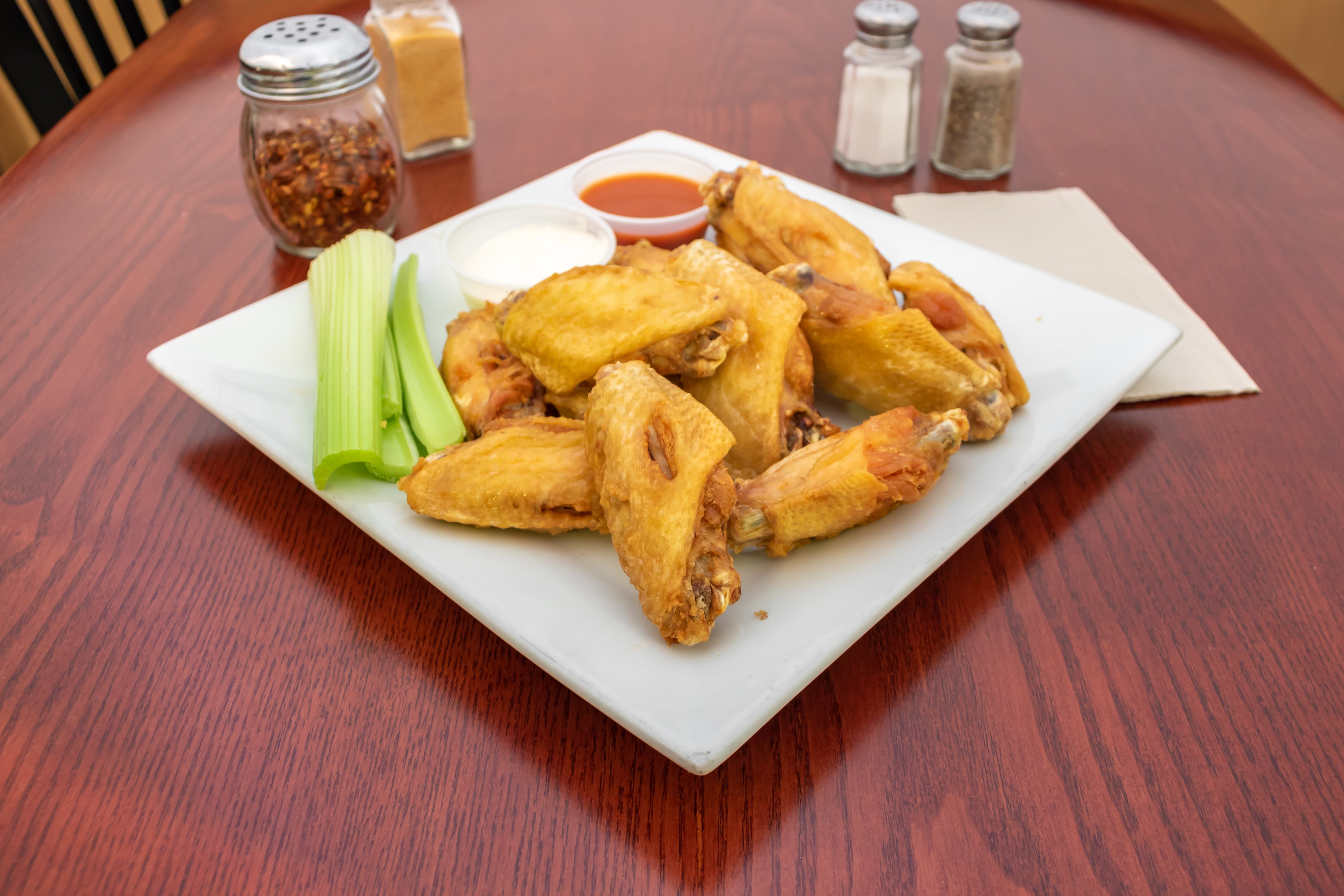 Order Buffalo Reg Wings - 6 Pieces food online from Brothers Pizza store, Princeton Junction on bringmethat.com