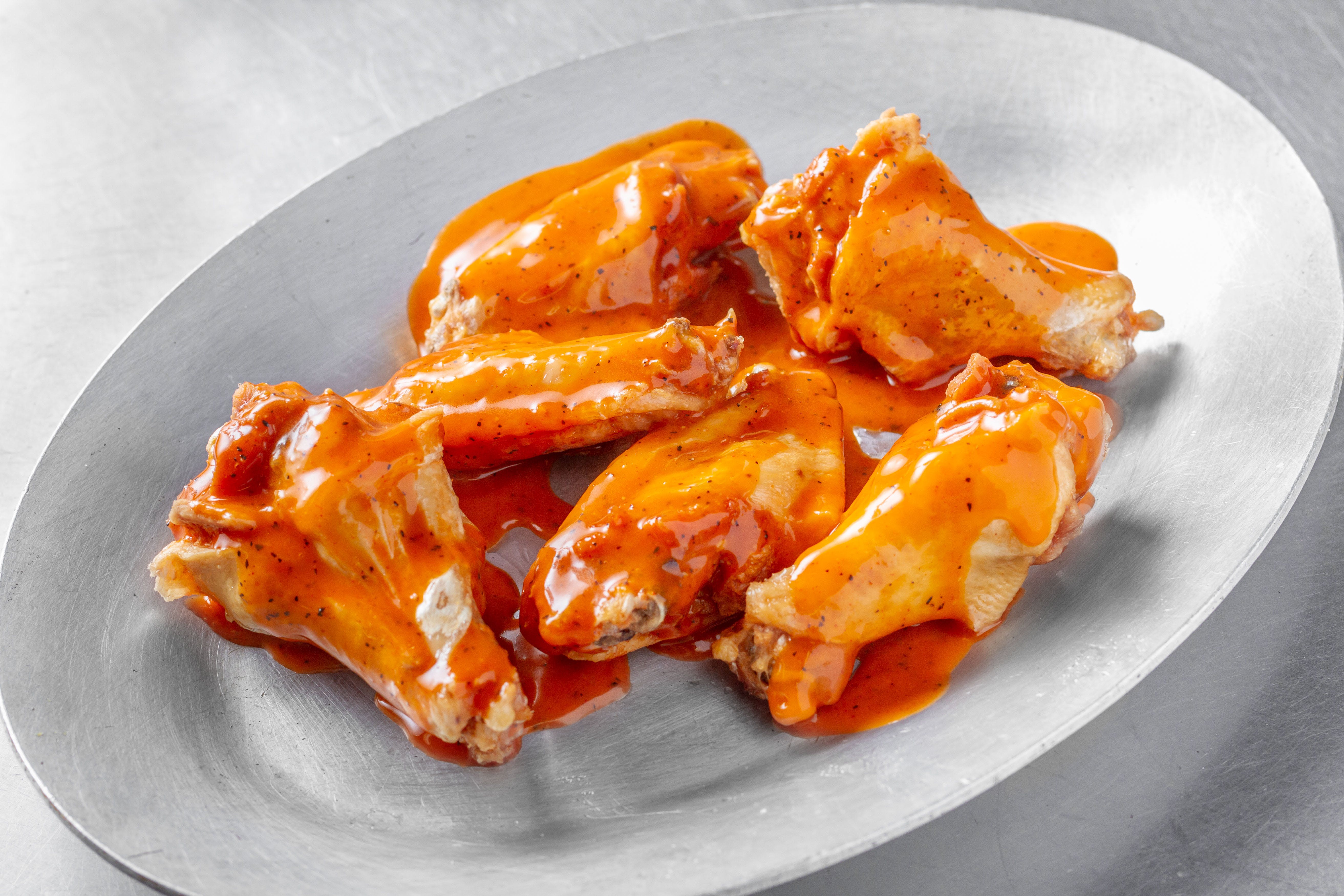 Order Jumbo Buffalo Wings - 6 Pieces food online from Pizza Planet store, Baltimore on bringmethat.com