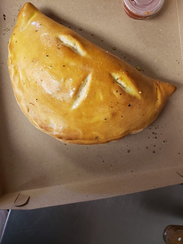 Order Cheese Calzone - Calzone food online from Max Pizza store, Maxton on bringmethat.com