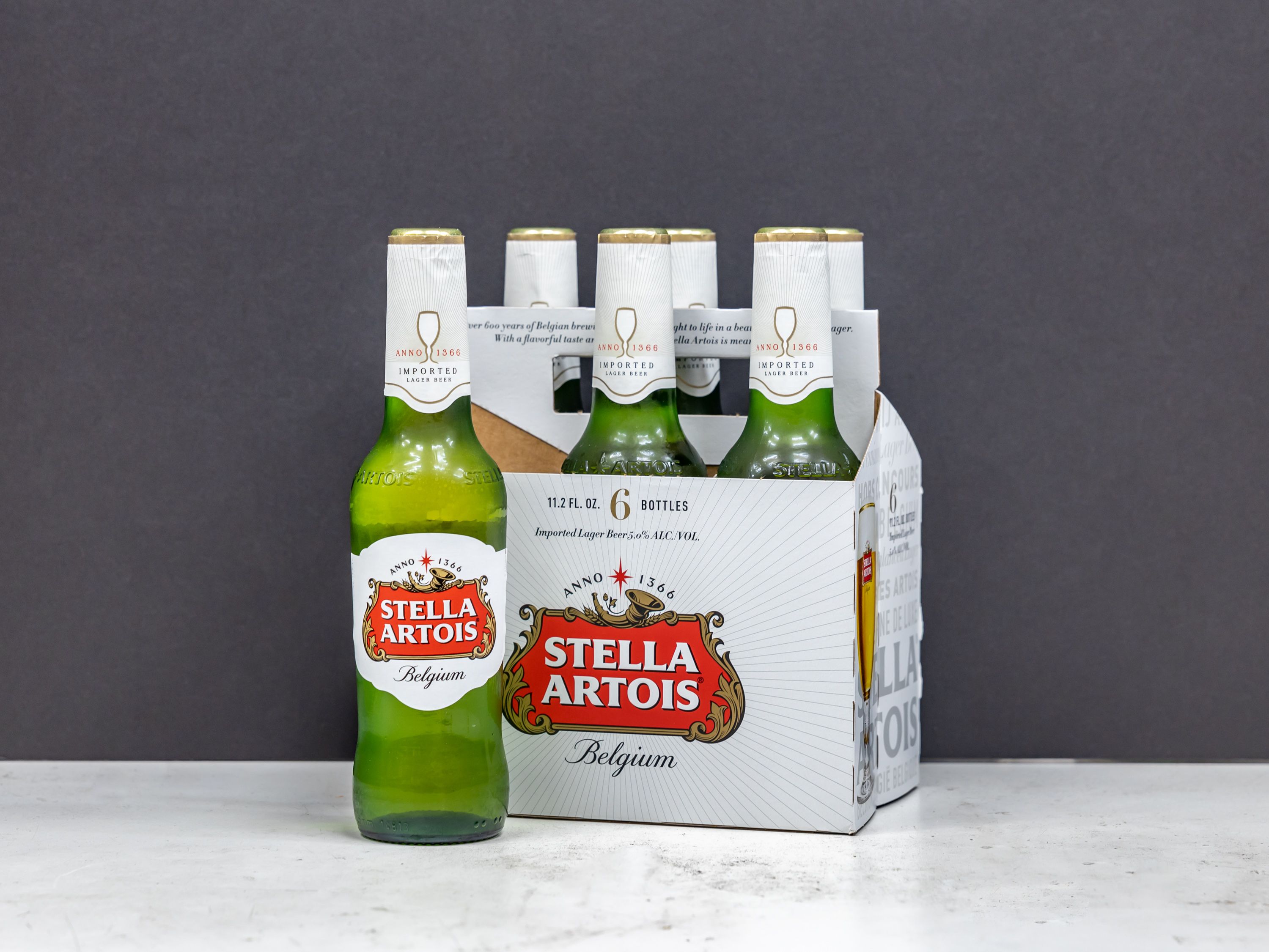 Order Stella Artois, 6 Pack, 12 oz. Bottle Beer food online from Vic Liquors store, El Monte on bringmethat.com