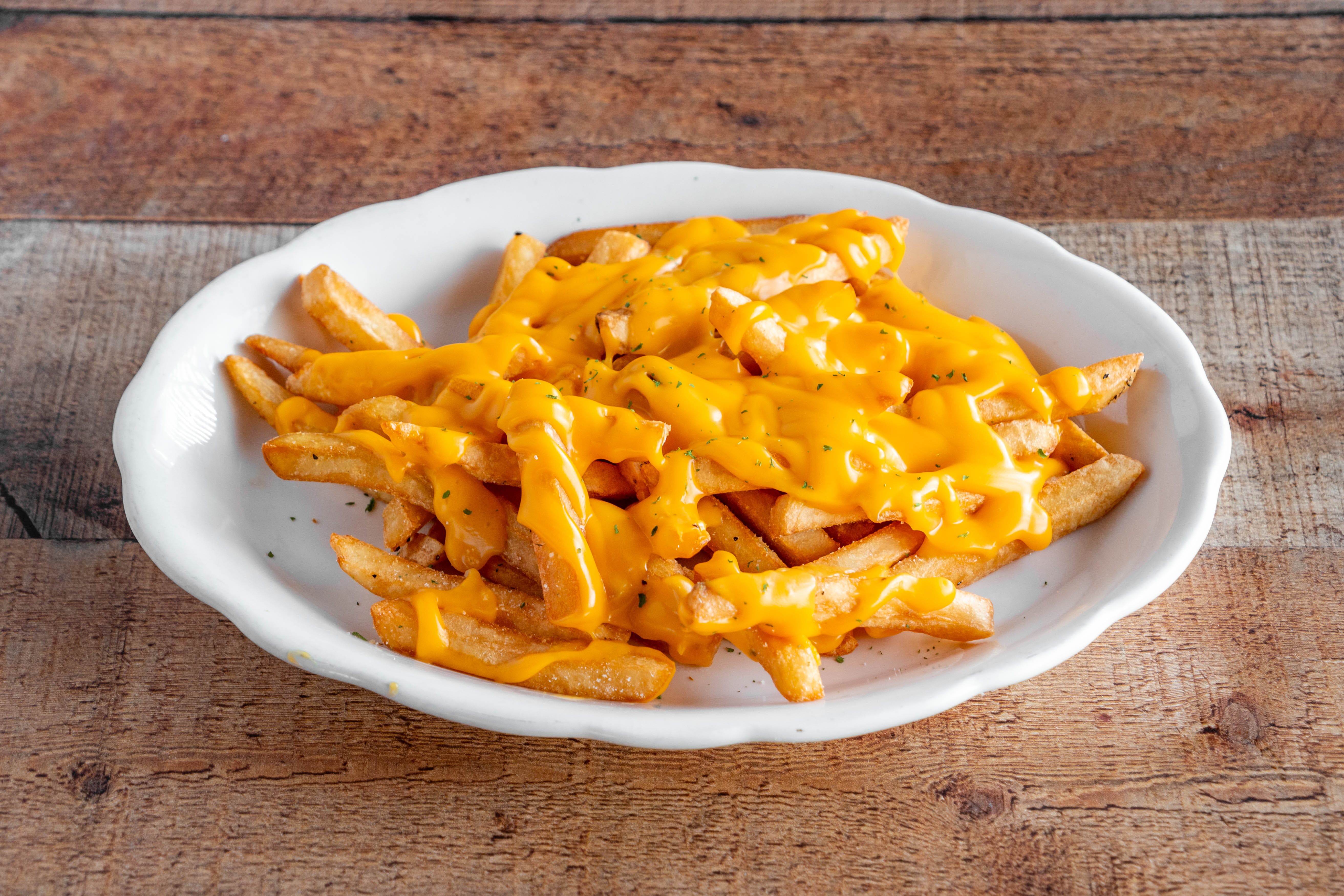 Order Cheese Fries - Appetizer food online from Fratelli Pizzeria & Cafe store, Bethlehem on bringmethat.com