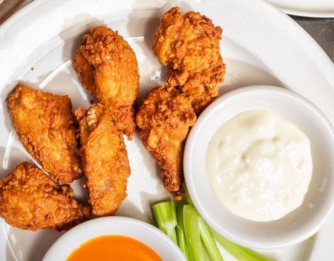 Order Buffalo Wings - 12 Pieces food online from Mamma Mia Trattoria store, Langhorne on bringmethat.com