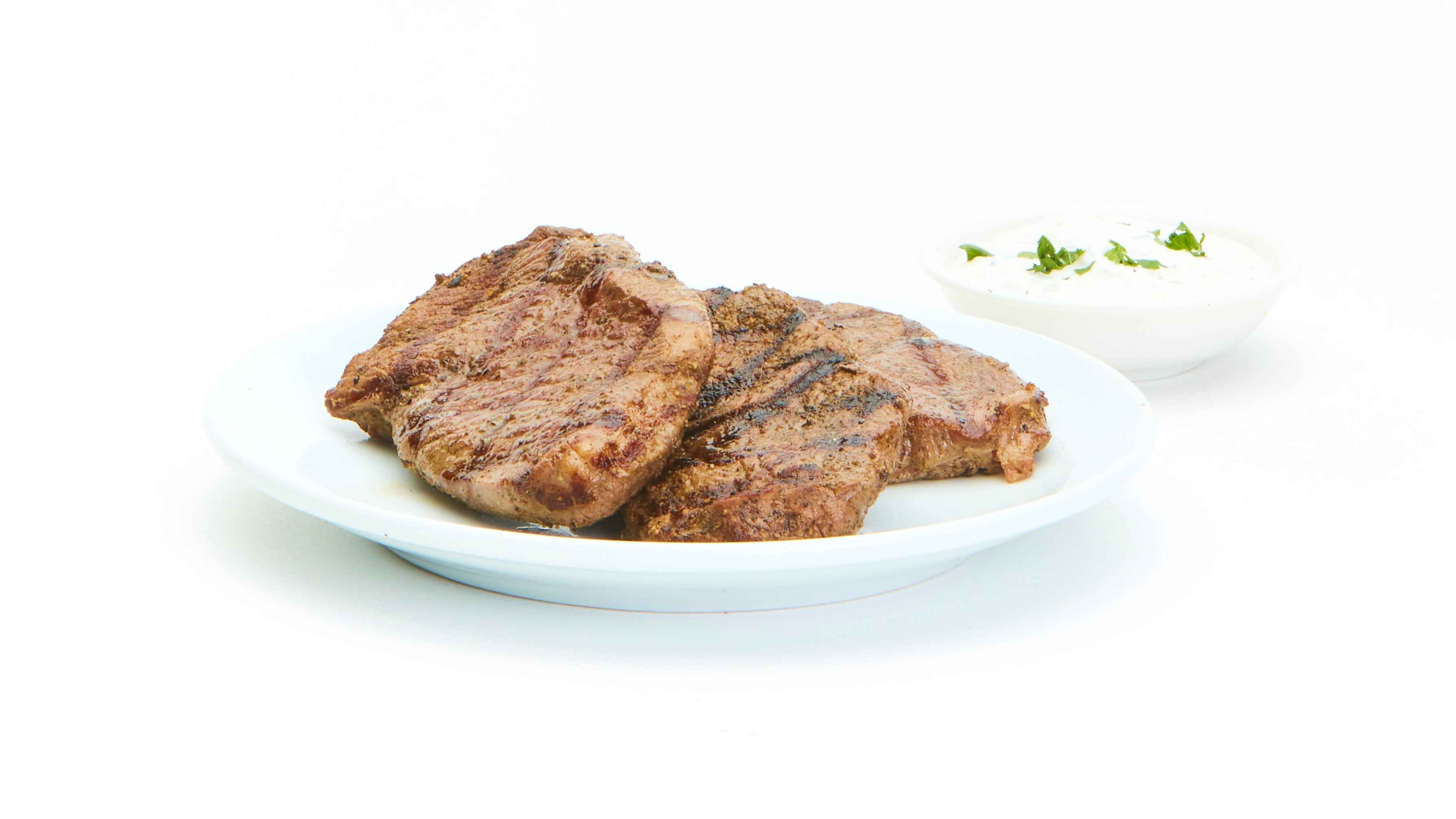 Order Extra Side of Lamb food online from Taziki's Mediterranean Cafe store, Charlotte on bringmethat.com