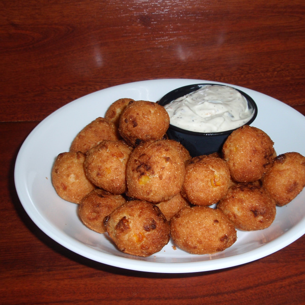 Order 20 Pieces Hushpuppies food online from Pizza Paradise store, Austin on bringmethat.com
