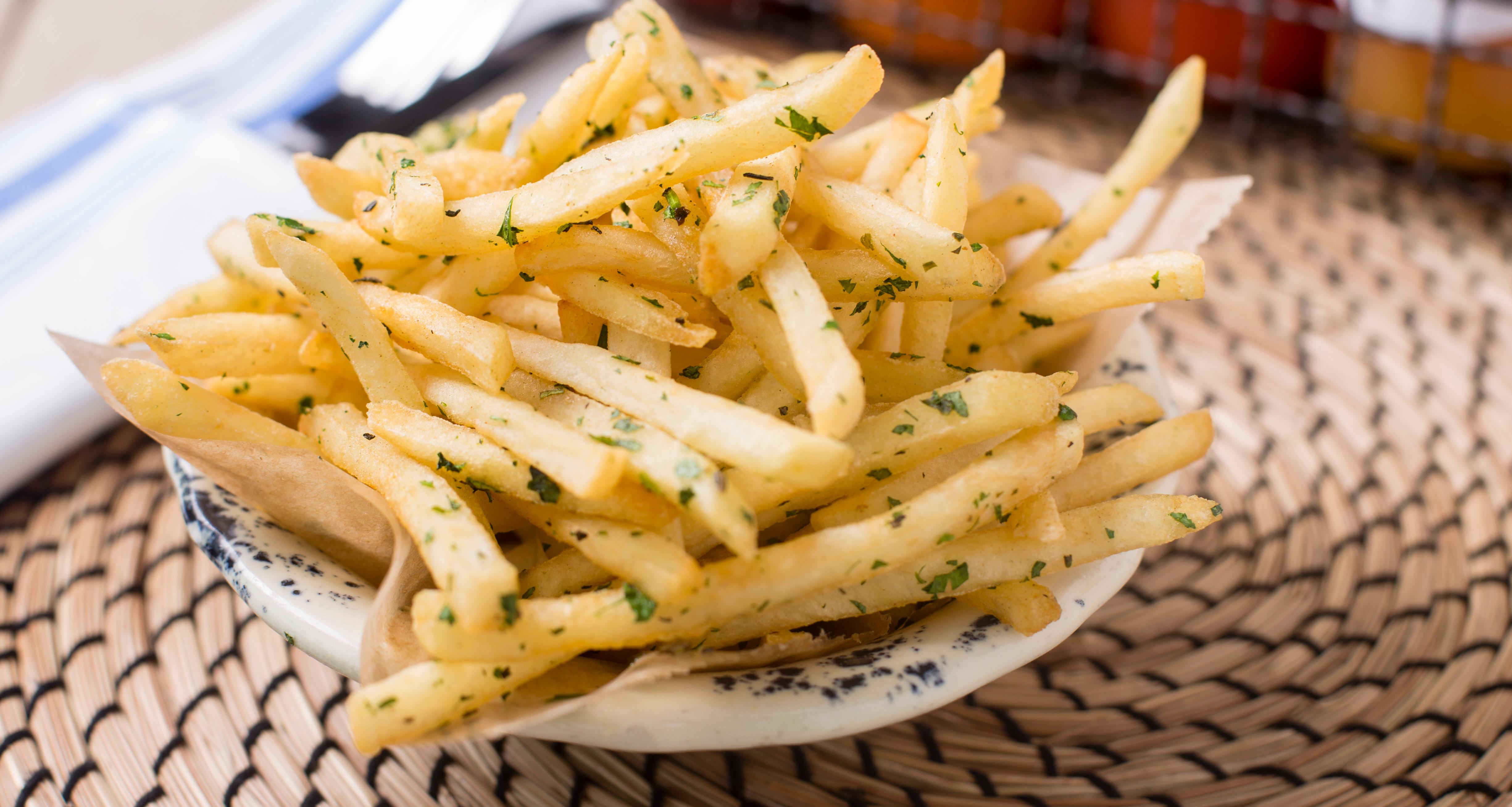 Order Garlic Butter Fries food online from Whistle Britches store, Dallas on bringmethat.com