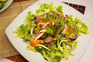 Order SS3 Yum Nuer / Beef Salad food online from Saigon Cafe store, Cherokee County on bringmethat.com