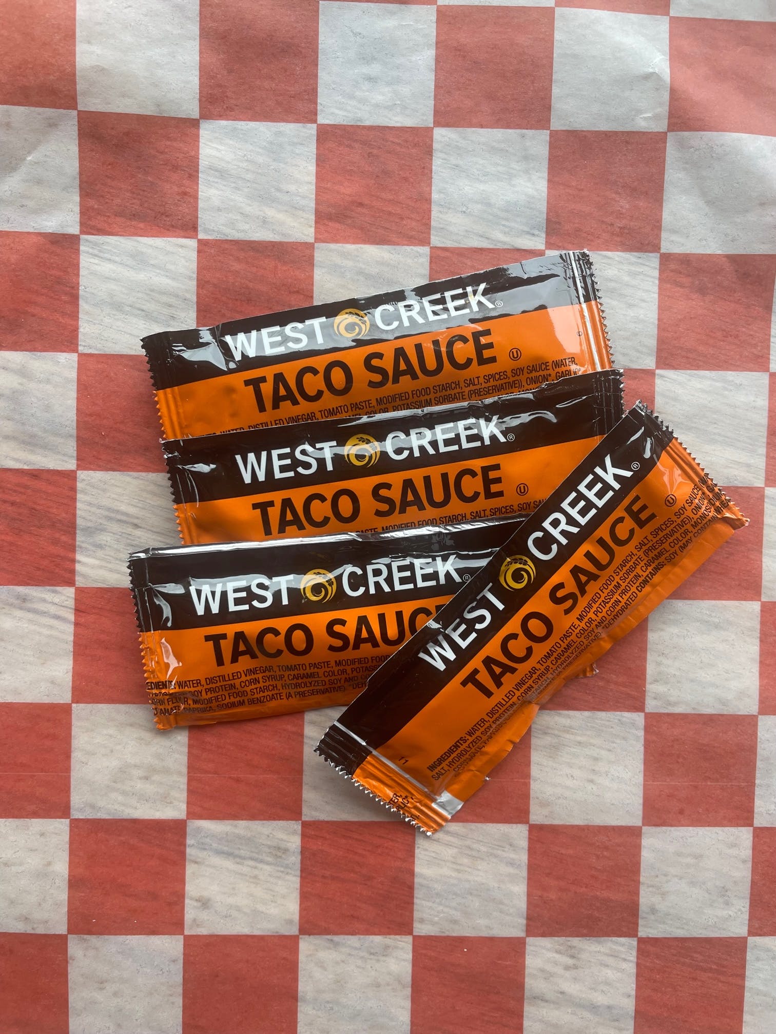 Order Taco Sauce - Four Packets food online from Jimmy's Pizza store, Cold Spring on bringmethat.com