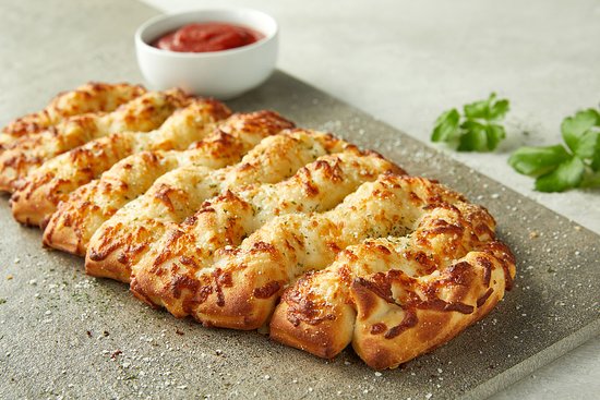 Order Asiago Cheese Bread food online from Donatos Pizza store, Bowling Green on bringmethat.com