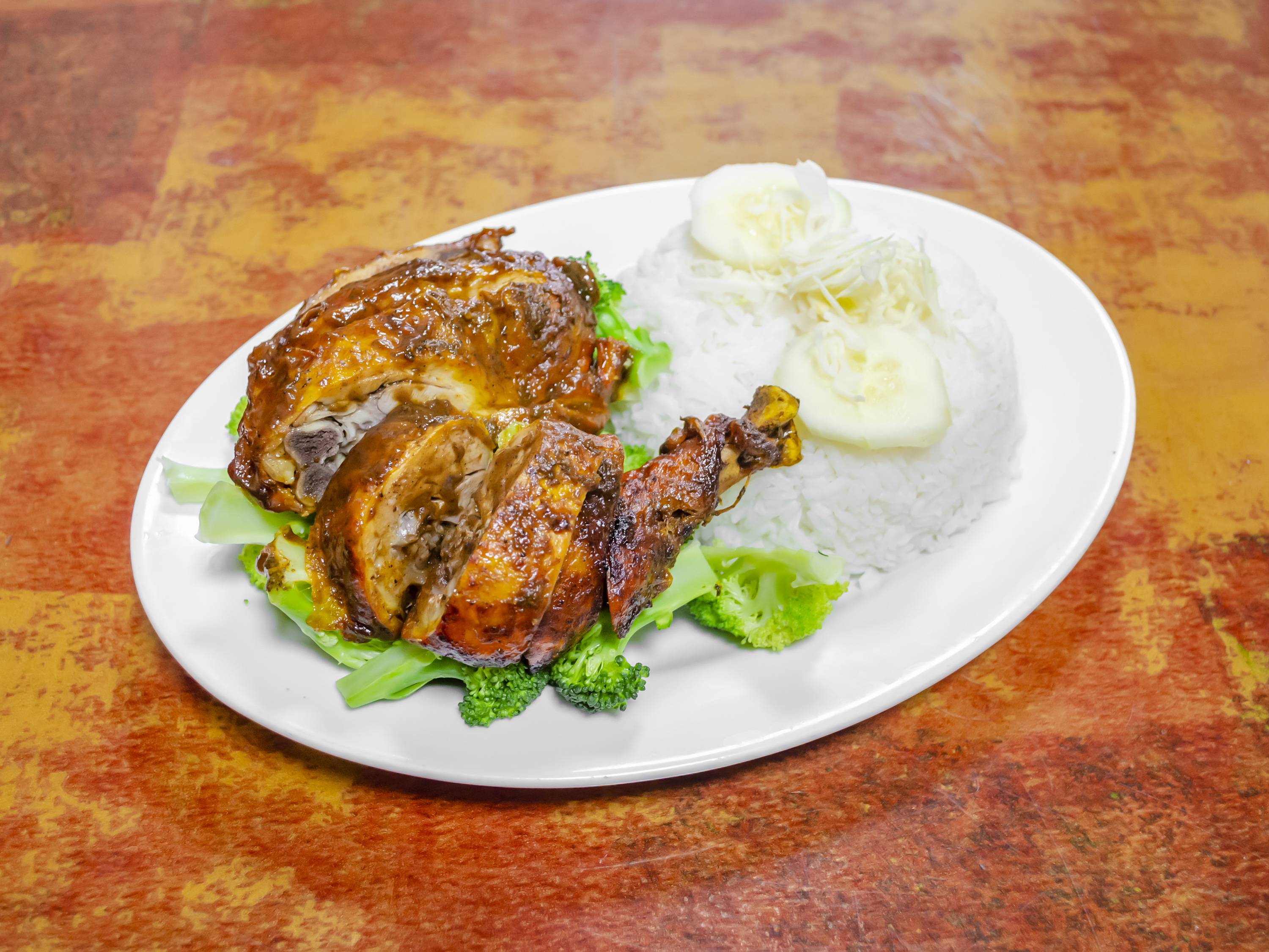 Order Jerk Chicken with Broccoli food online from Coconut Palm Bar & Grill store, Bronx on bringmethat.com