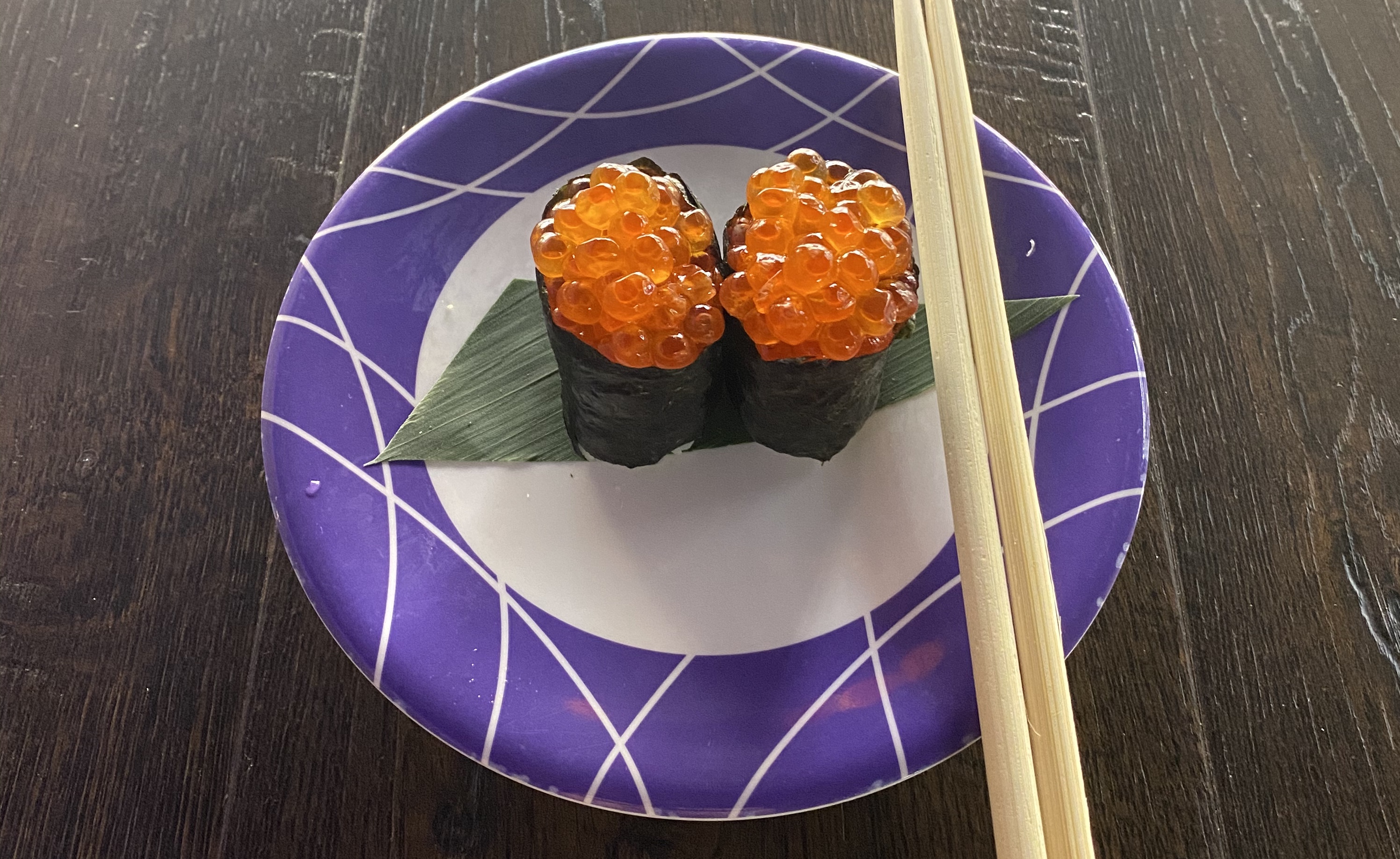 Order Ikura Nigiri - 2 Pieces food online from Sushi Train store, Minneapolis on bringmethat.com
