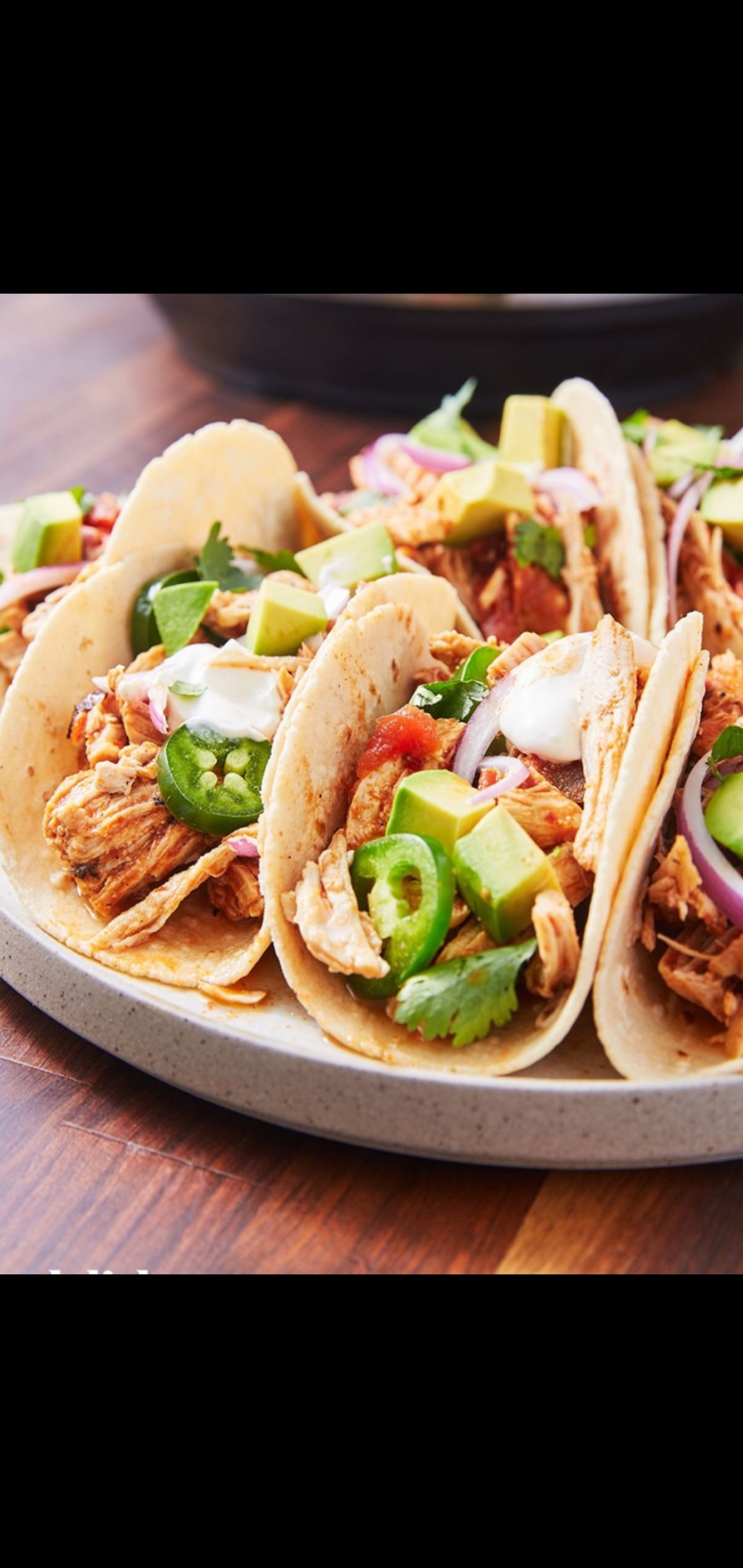 Order Spicy & Savory Chicken Tacos (grilled chicken, avocado, jalapeños, red onions, cilantro, chipotle sauce & side sour cream) food online from American Gourmet Foods Deli store, New York on bringmethat.com