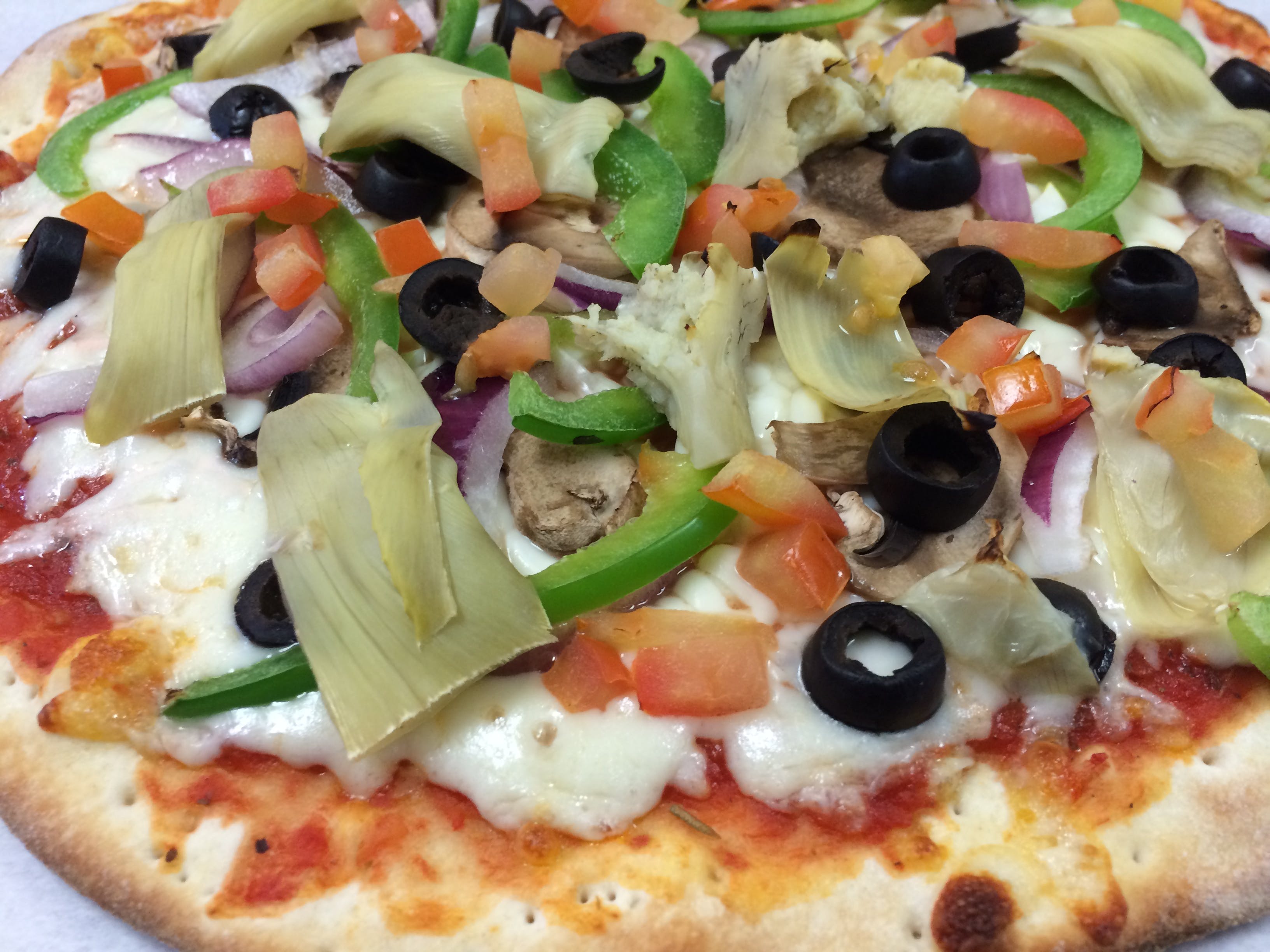 Order Vegetarian Pizza - Small food online from I pizza store, Newark on bringmethat.com