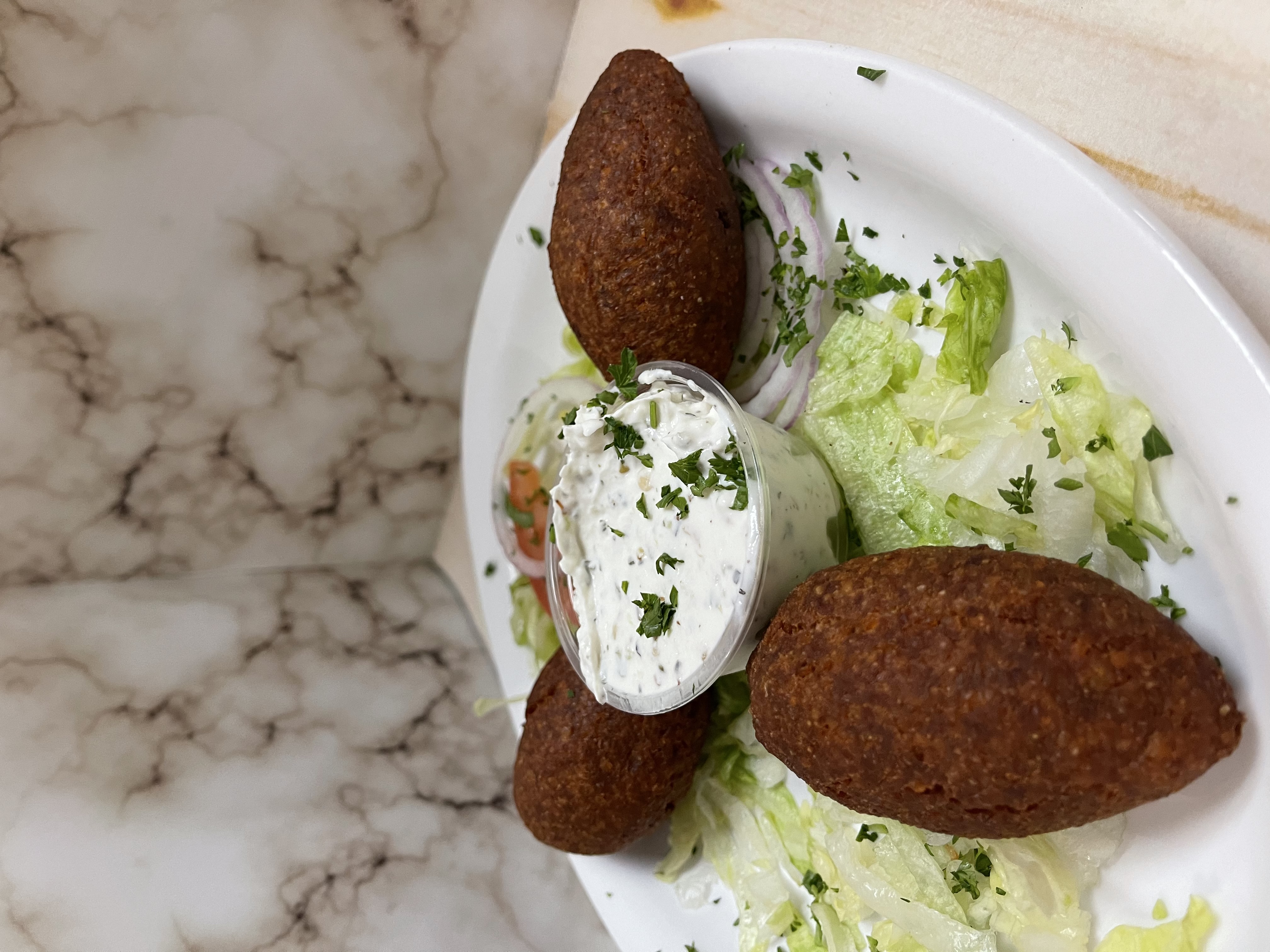 Order Kibbeh food online from Yasmines Cafe store, Albuquerque on bringmethat.com