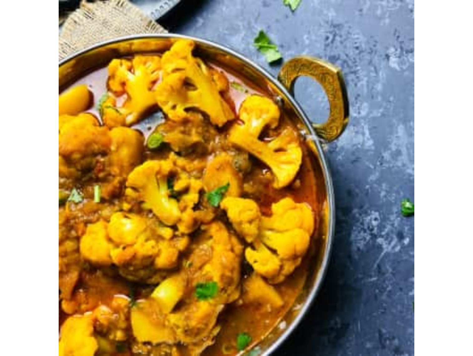 Order Aloo Gobi food online from Cafe India store, Franklin on bringmethat.com