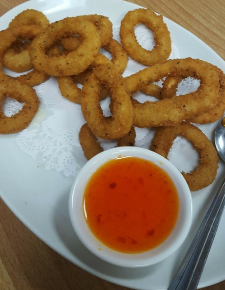 Order Fried Calamari food online from Khun Moo Thai Kitchen store, Northridge on bringmethat.com