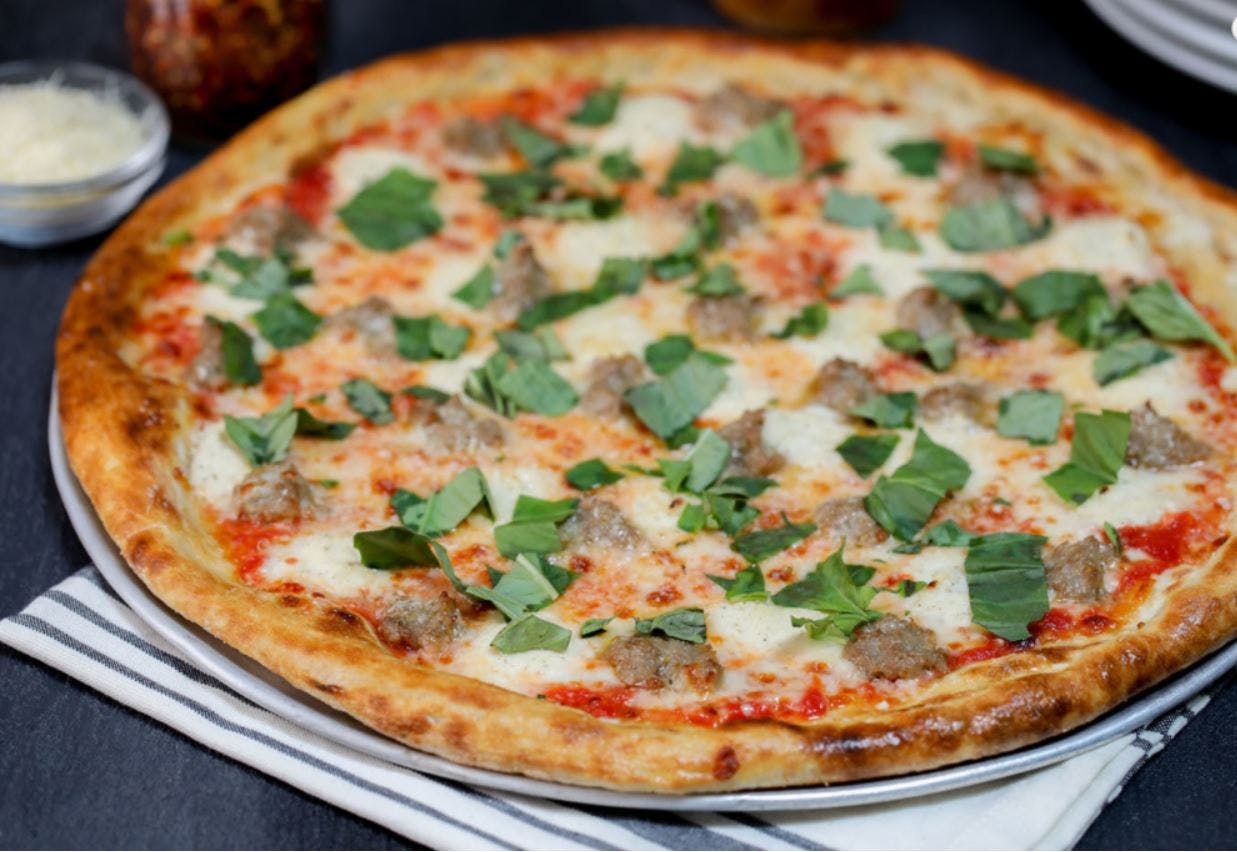 Order Neapolitan Salsiccia Pizza - 10'' food online from Patxi's Chicago Pizza store, San Francisco on bringmethat.com