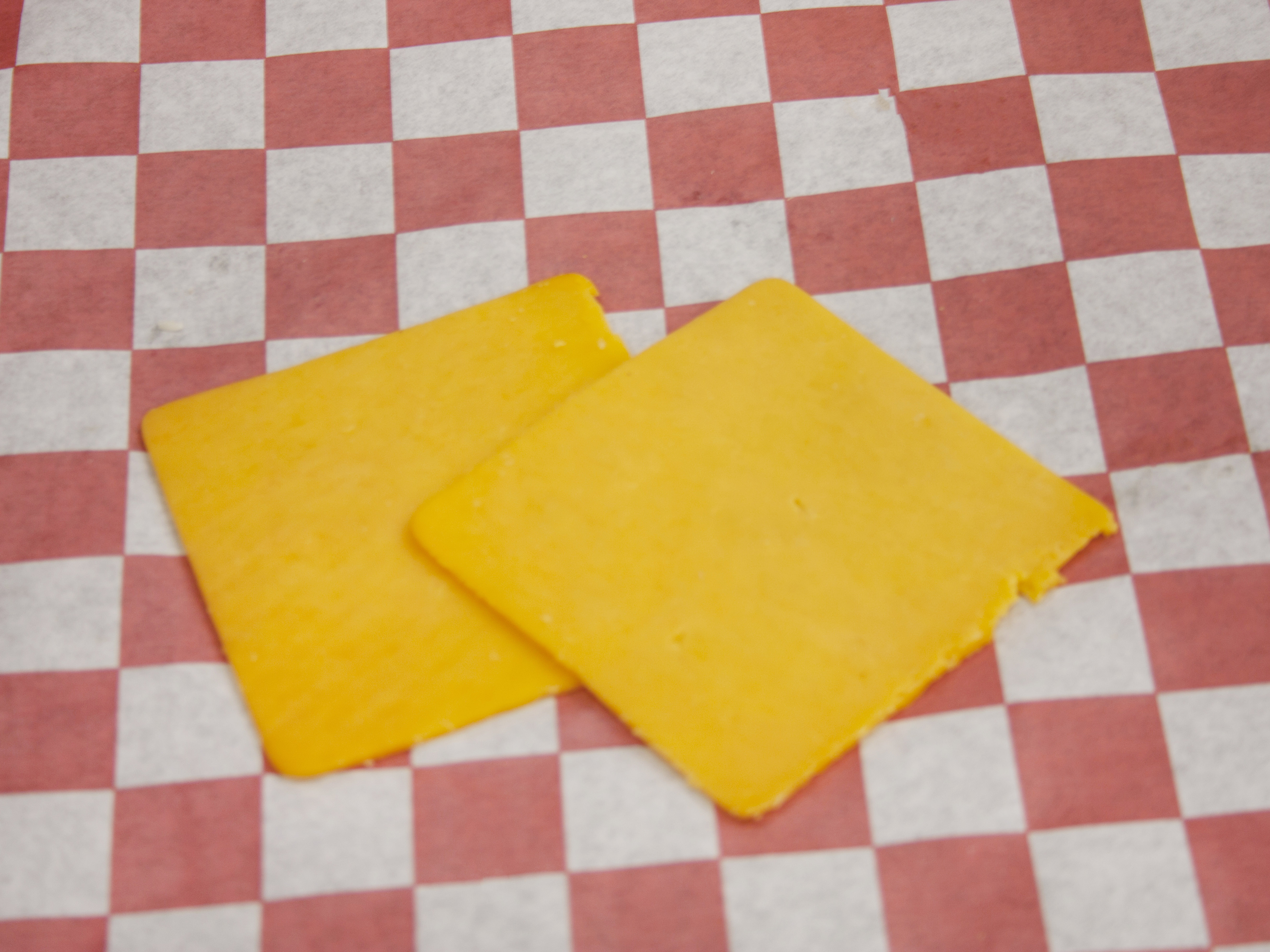 Order 1 lb. Mild Cheddar Cheese food online from Weaver's Market & Deli store, Logan on bringmethat.com